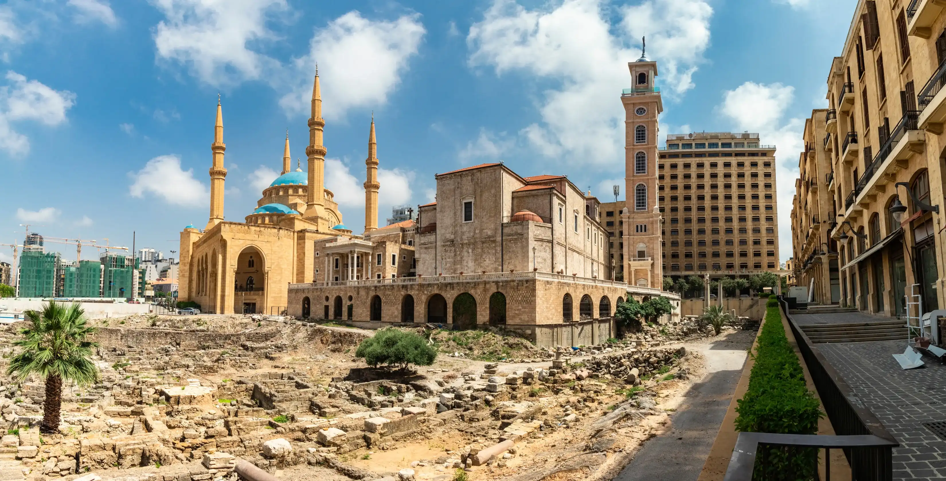 Beirut, Lebanon 06-10-2018: Al Amin Mosque and Saint Georges Church in Downtown Beirut, Lebanon Beirut, Lebanon 06-10-2018: Al Amin Mosque and Saint Georges Church in Downtown Beirut, Lebanon