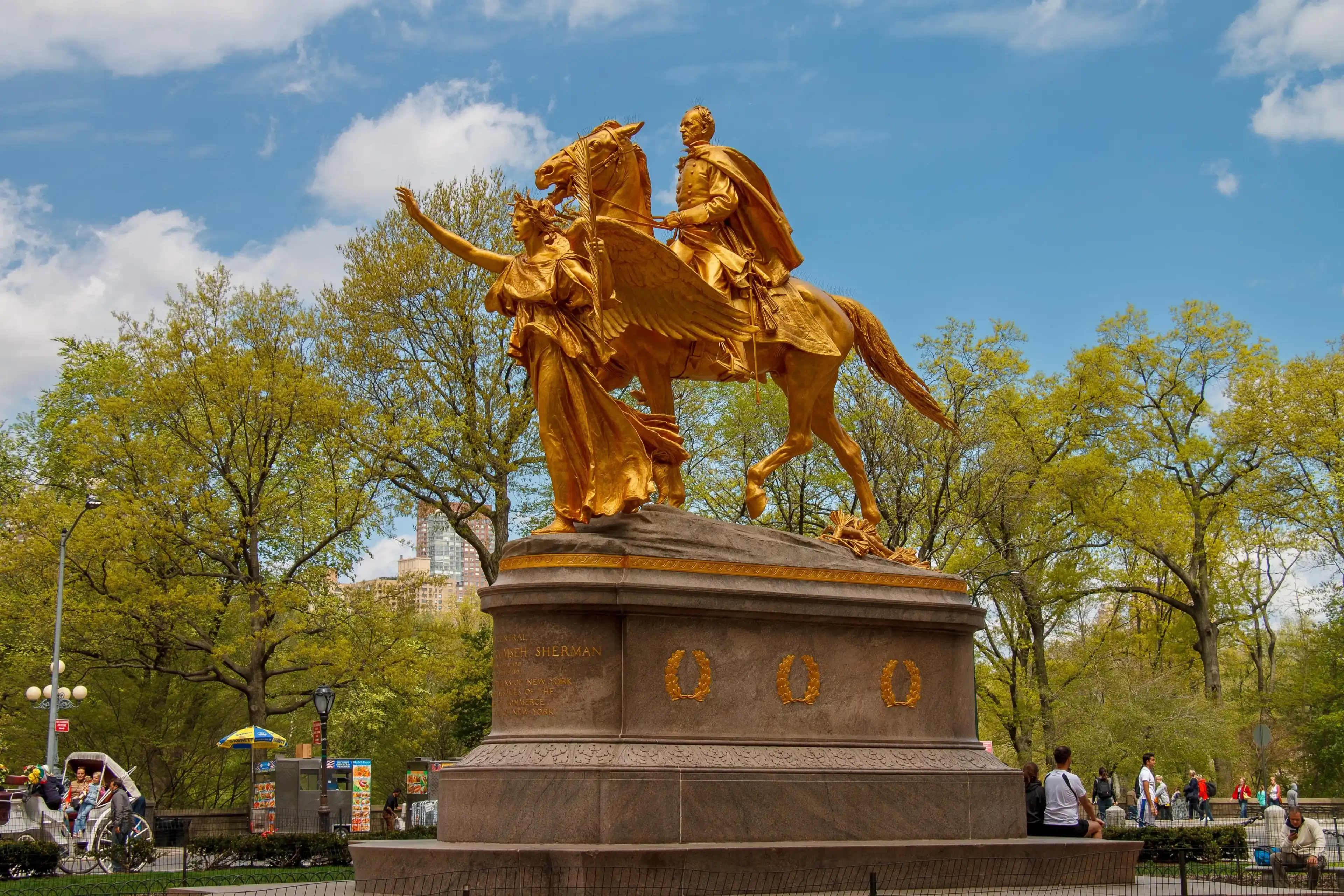 New York City, NY, USA - May, 5th, 2014. The golden monument of General William Tecumseh Sherman with a guiding female angel in Central Park, Manhattan, New York City New York City, NY, USA - May, 5th, 2014. The golden monument of General William Tecumseh Sherman with a guiding female angel in Central Park, Manhattan, New York City