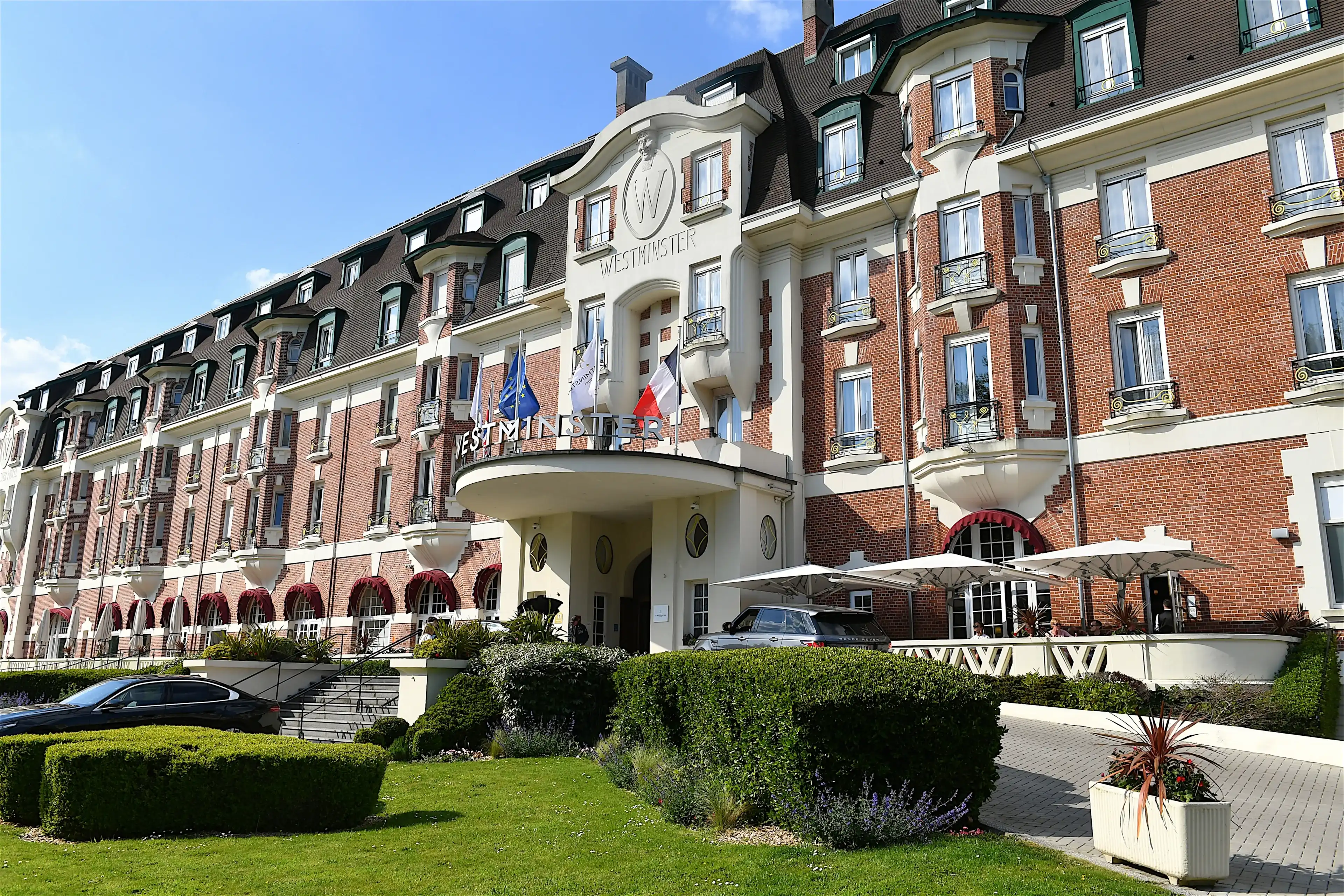 Le Touquet-Paris-Plage, France-05 11 2024: The main entrance gate of The Westminster luxury hotel in Le Touquet-Paris-Plage, France. Le Touquet-Paris-Plage, France-05 11 2024: The main entrance gate of The Westminster luxury hotel in Le Touquet-Paris-Plage, France.
