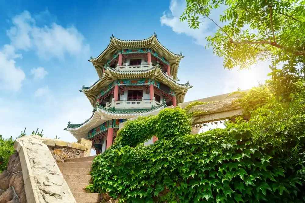 A Chinese-style building located on a hill: Pavilion. Qingdao, China. A Chinese-style building located on a hill: Pavilion. Qingdao, China.