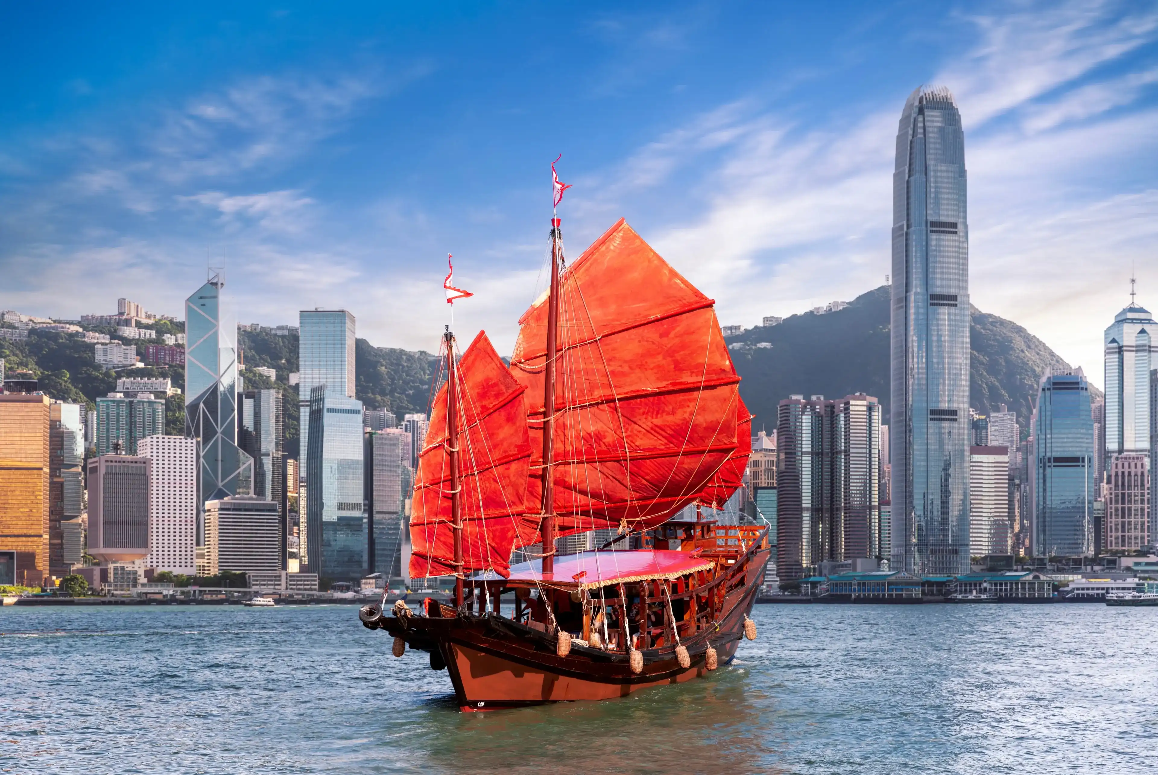 Red vintage sailboat for tourist pass from Hong king city side to kowloon city, Hongkong icon for travel, China Red vintage sailboat for tourist pass from Hong king city side to kowloon city, Hongkong icon for travel, China