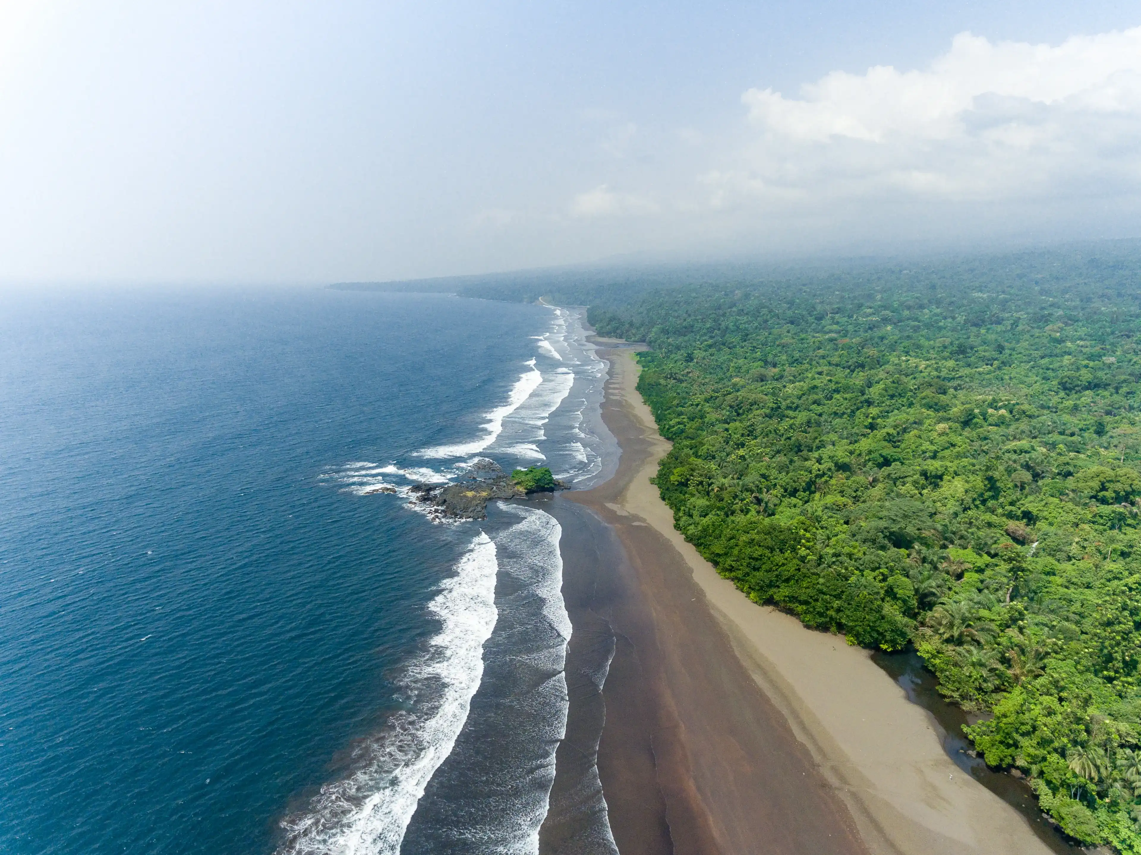 Aerial View of the ocean and jungle in Equatorial Guinea Aerial View of the ocean and jungle in Equatorial Guinea