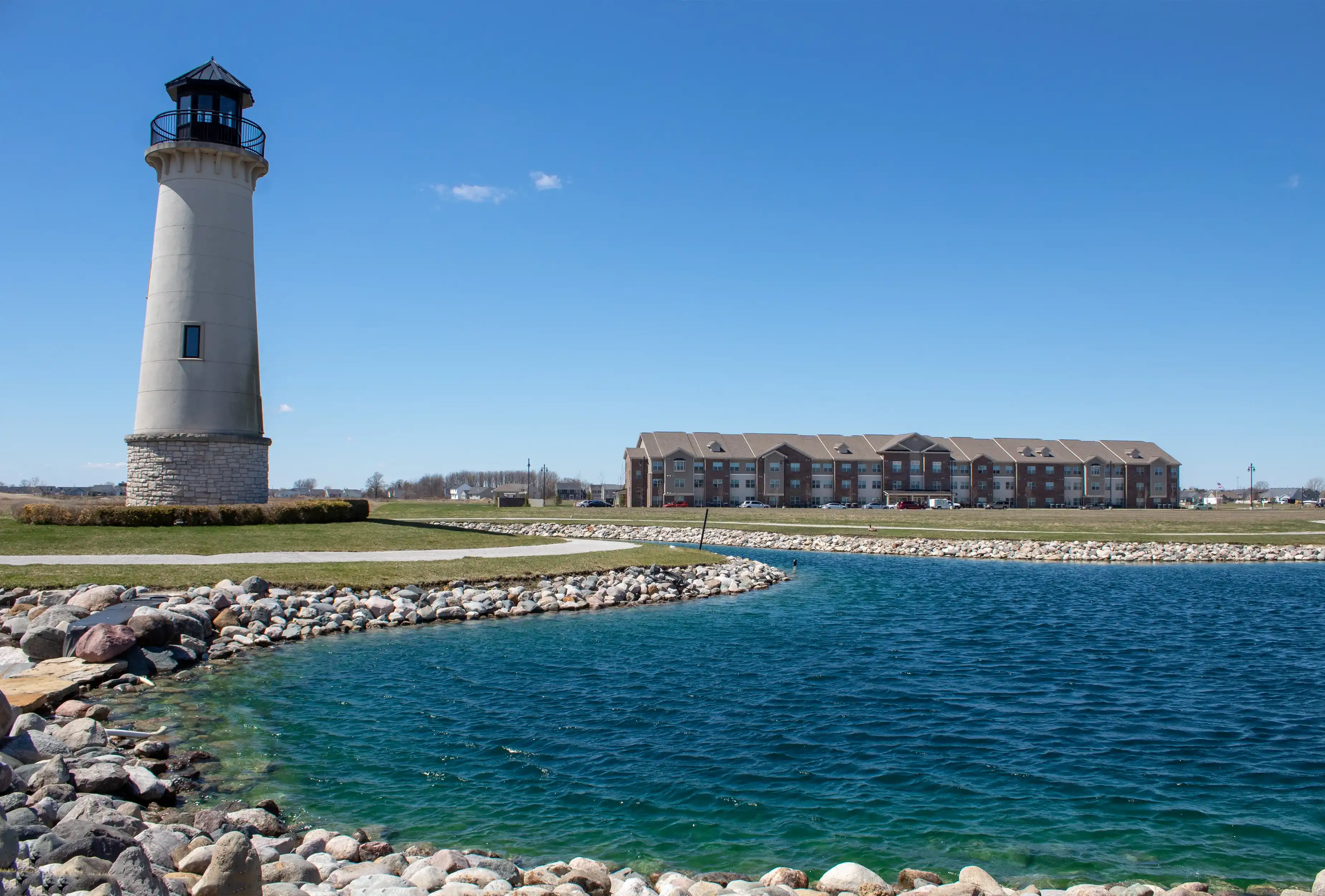 Perrysburg, OH / USA - April 15, 2019: View of the lighthouse and Harbor Town Senior Residence in Perrysburg, Ohio. Perrysburg, OH / USA - April 15, 2019: View of the lighthouse and Harbor Town Senior Residence in Perrysburg, Ohio.