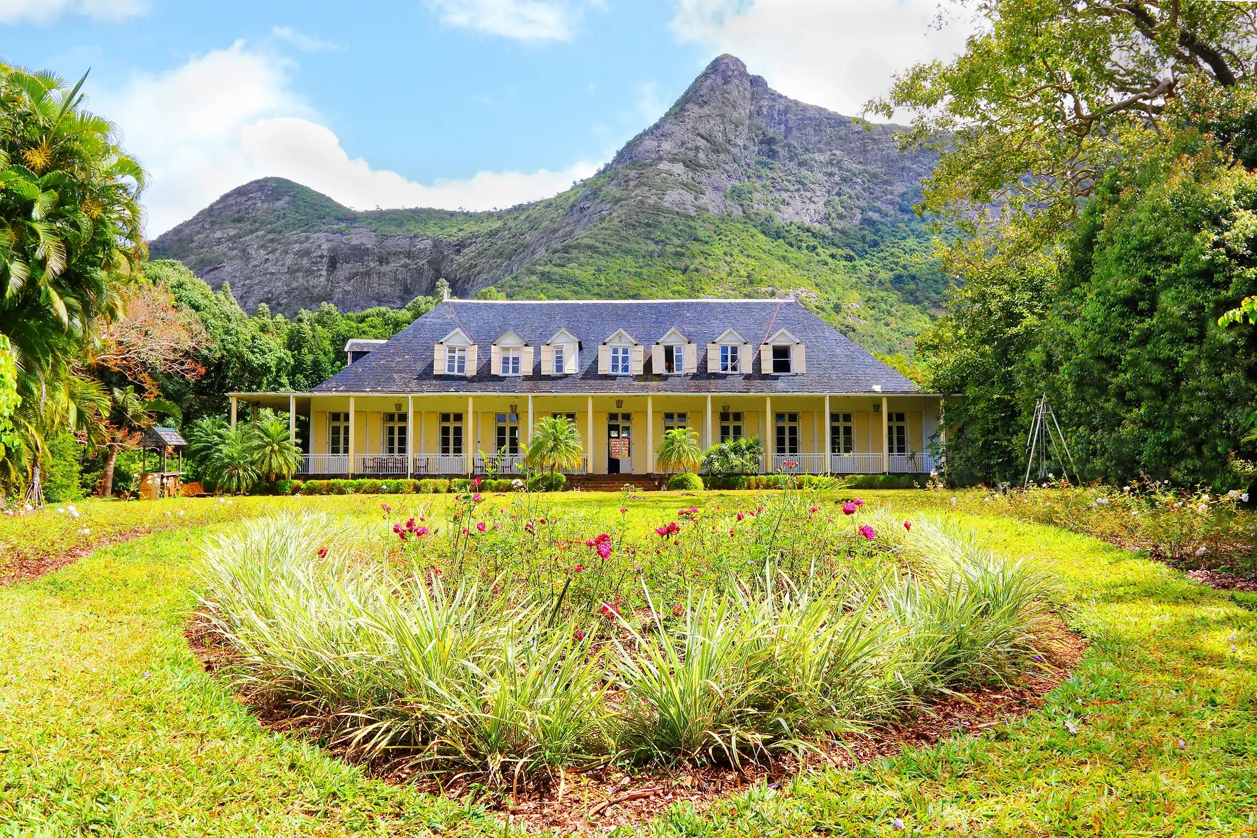 EUREKA, MAURITIUS - 30. OCTOBER, 2015: Eureka House (Maison Eureka) is a unique Creole house built in 1830 located by the river of Moka. EUREKA, MAURITIUS - 30. OCTOBER, 2015: Eureka House (Maison Eureka) is a unique Creole house built in 1830 located by the river of Moka.