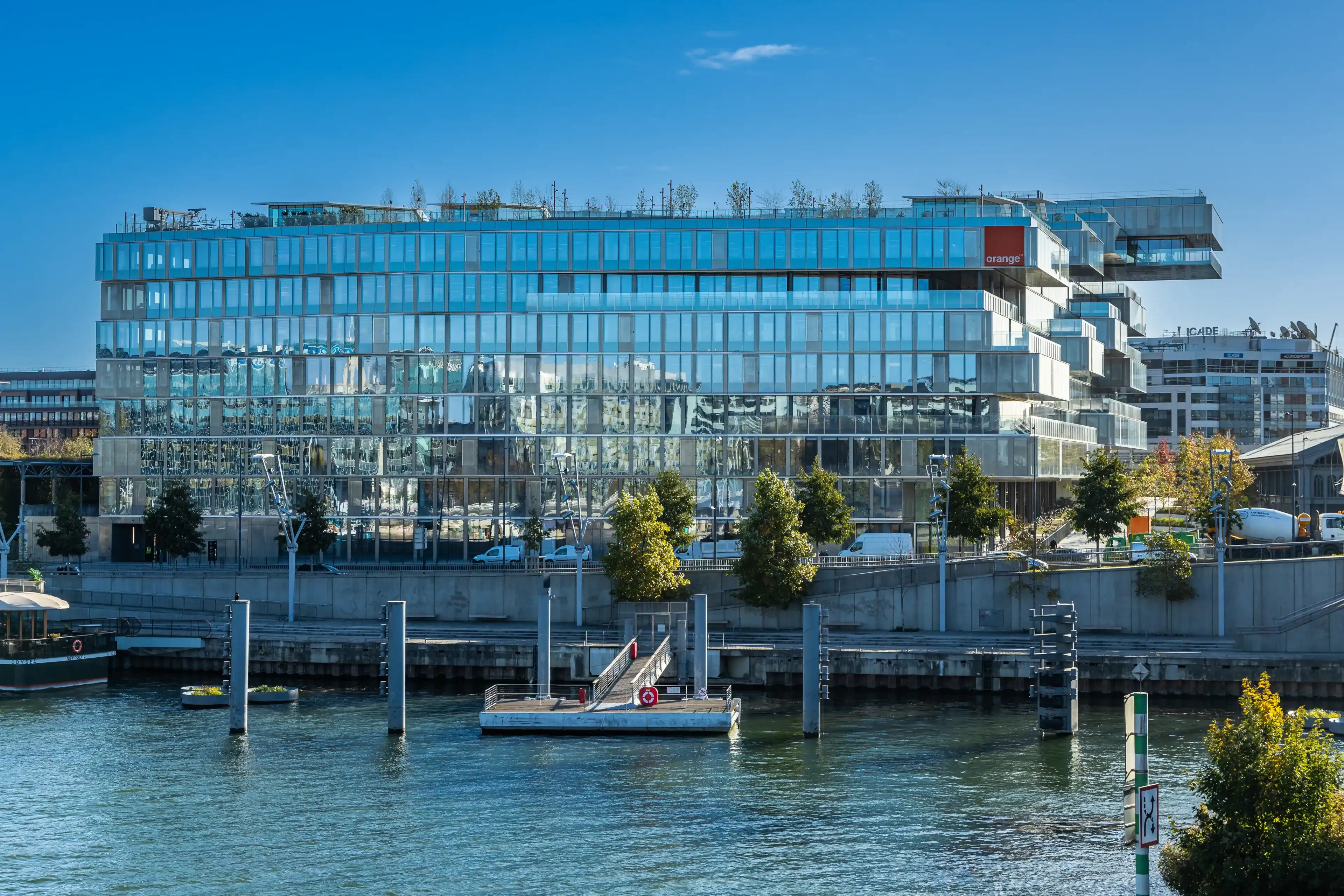 Issy-les-Moulineaux, France - October 2021 : Orange S.A headquarters building in Issy les Moulineaux near Paris, France Issy-les-Moulineaux, France - October 2021 : Orange S.A headquarters building in Issy les Moulineaux near Paris, France