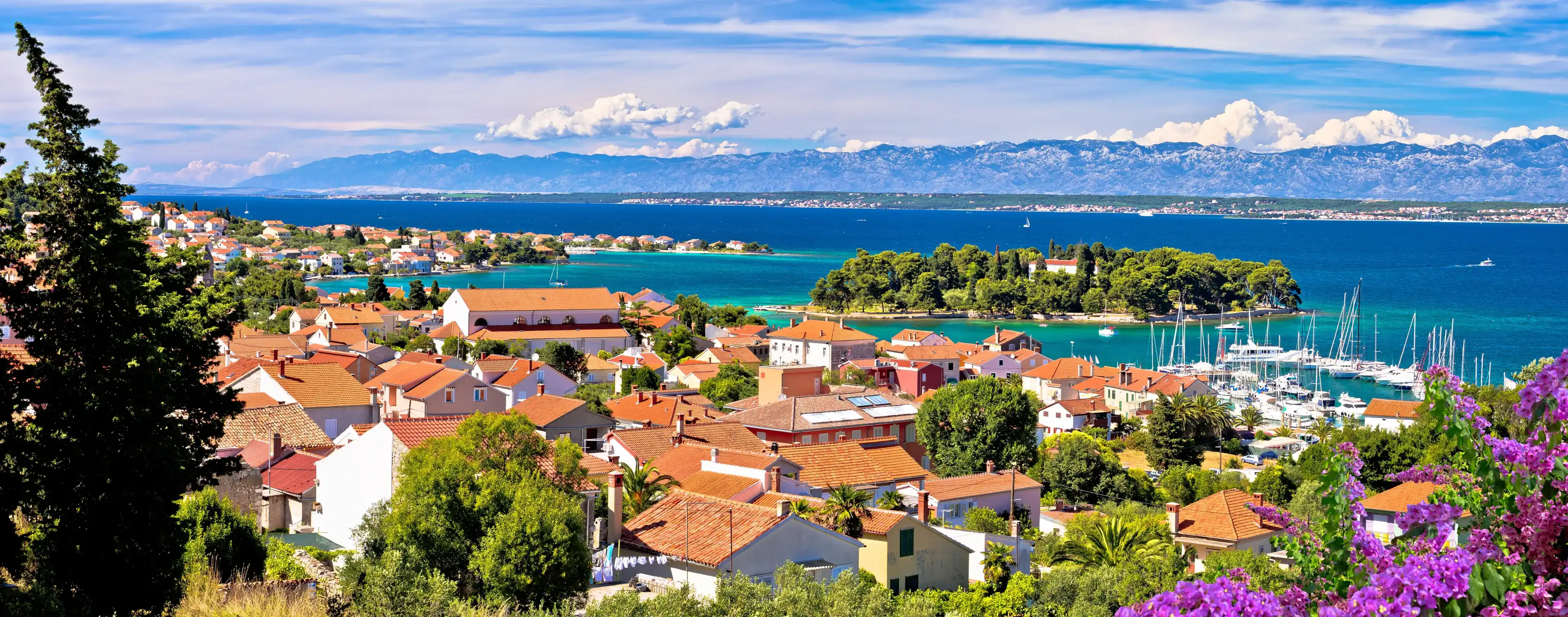 Zadar archipelago. Island of Ugljan waterfront and Galovac islet panoramic view, Preko in Dalmatia region of Croatia Zadar archipelago. Island of Ugljan waterfront and Galovac islet panoramic view, Preko in Dalmatia region of Croatia