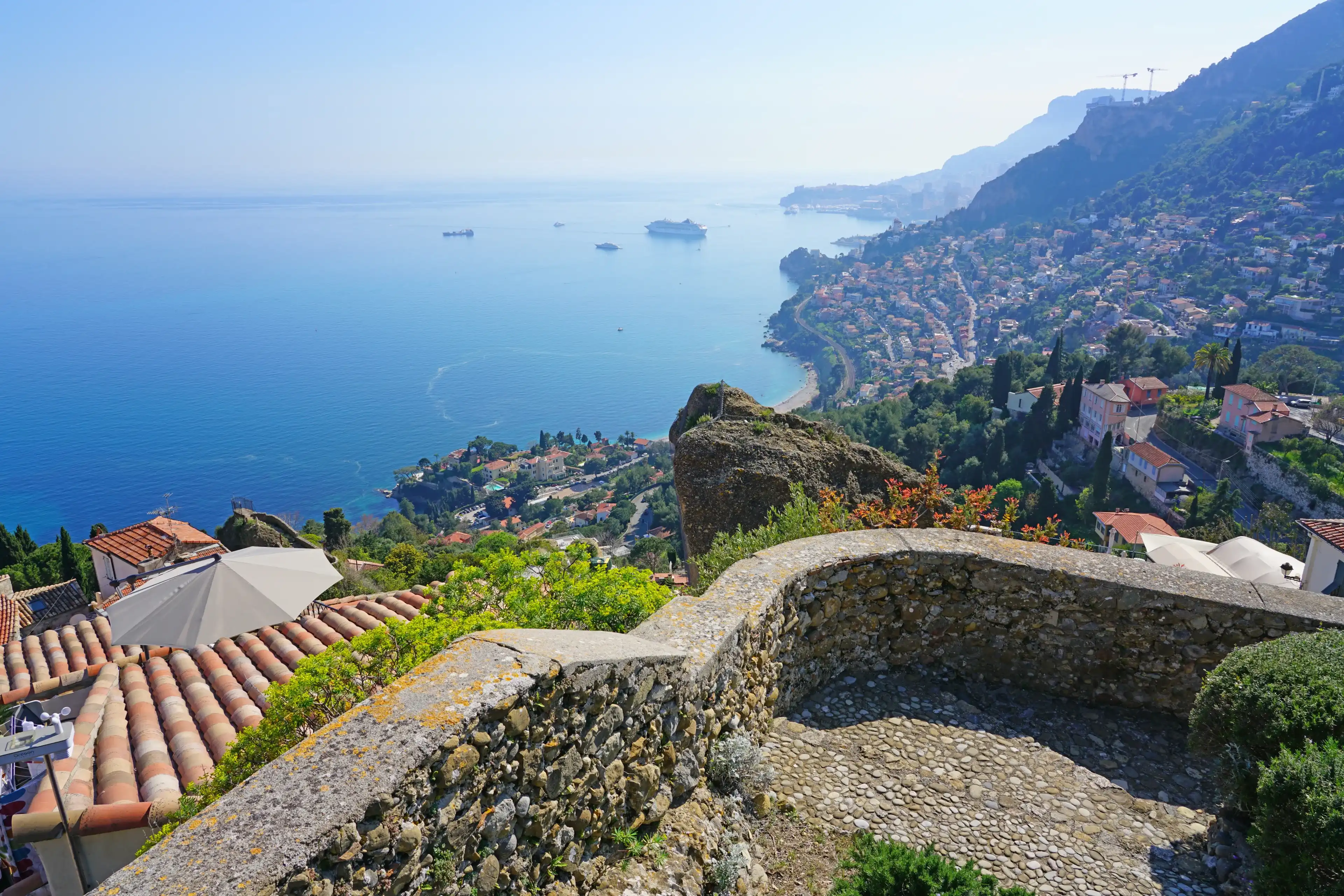 ROQUEBRUNE-CAP-MARTIN -22 APR 2018- View of the castle of Roquebrune in the perched fortified medieval village overlooking Roquebrune-Cap-Martin and the Mediterranean Sea on the French Riviera. ROQUEBRUNE-CAP-MARTIN -22 APR 2018- View of the castle of Roquebrune in the perched fortified medieval village overlooking Roquebrune-Cap-Martin and the Mediterranean Sea on the French Riviera.