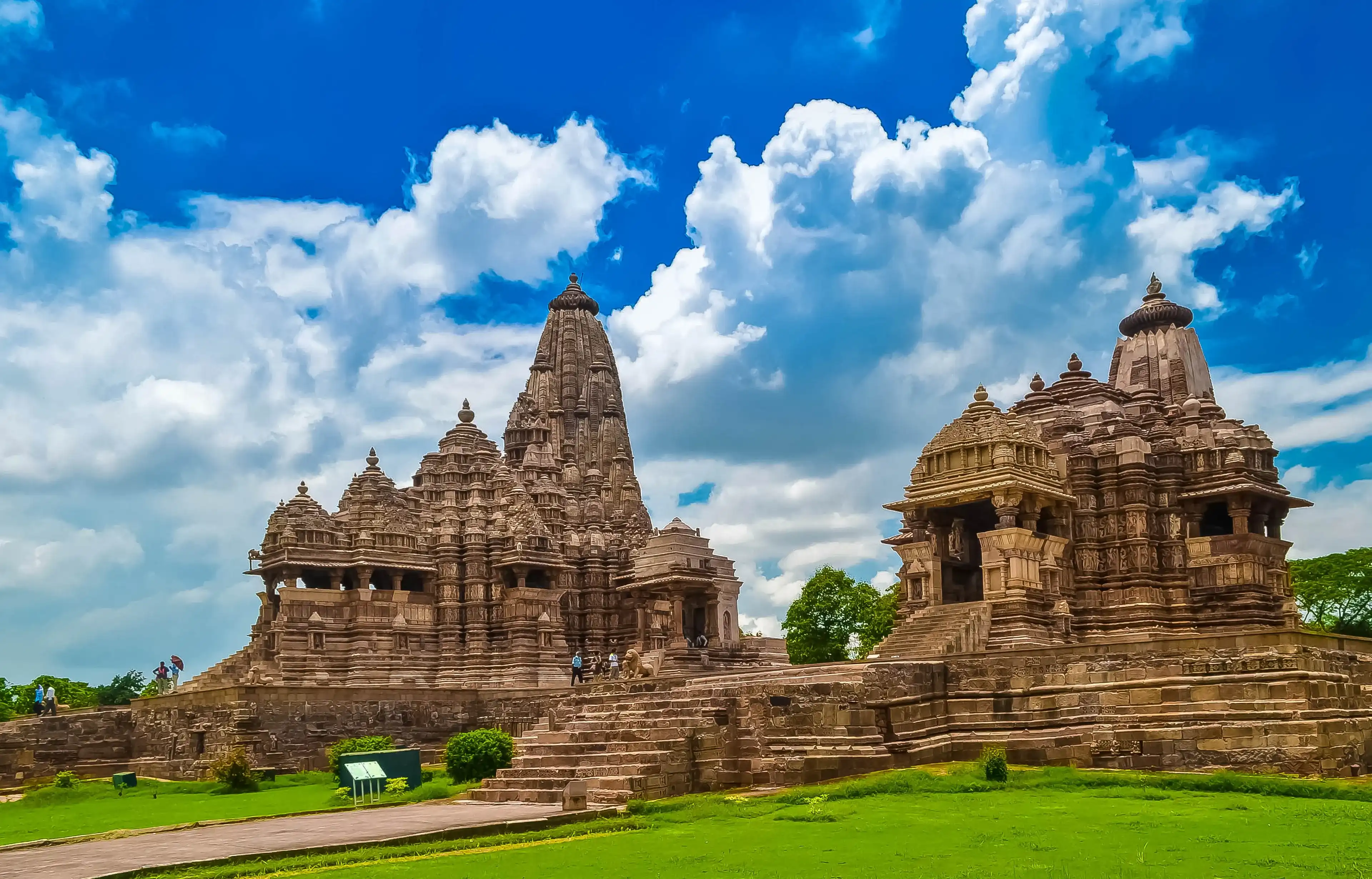 The Khajuraho Group of Monuments is a group of Hindu, Buddhist and Jain temples in Madhya Pradesh, India.It is famous for its ancient temples that depict some of the finest art in the world. The Khajuraho Group of Monuments is a group of Hindu, Buddhist and Jain temples in Madhya Pradesh, India.It is famous for its ancient temples that depict some of the finest art in the world.