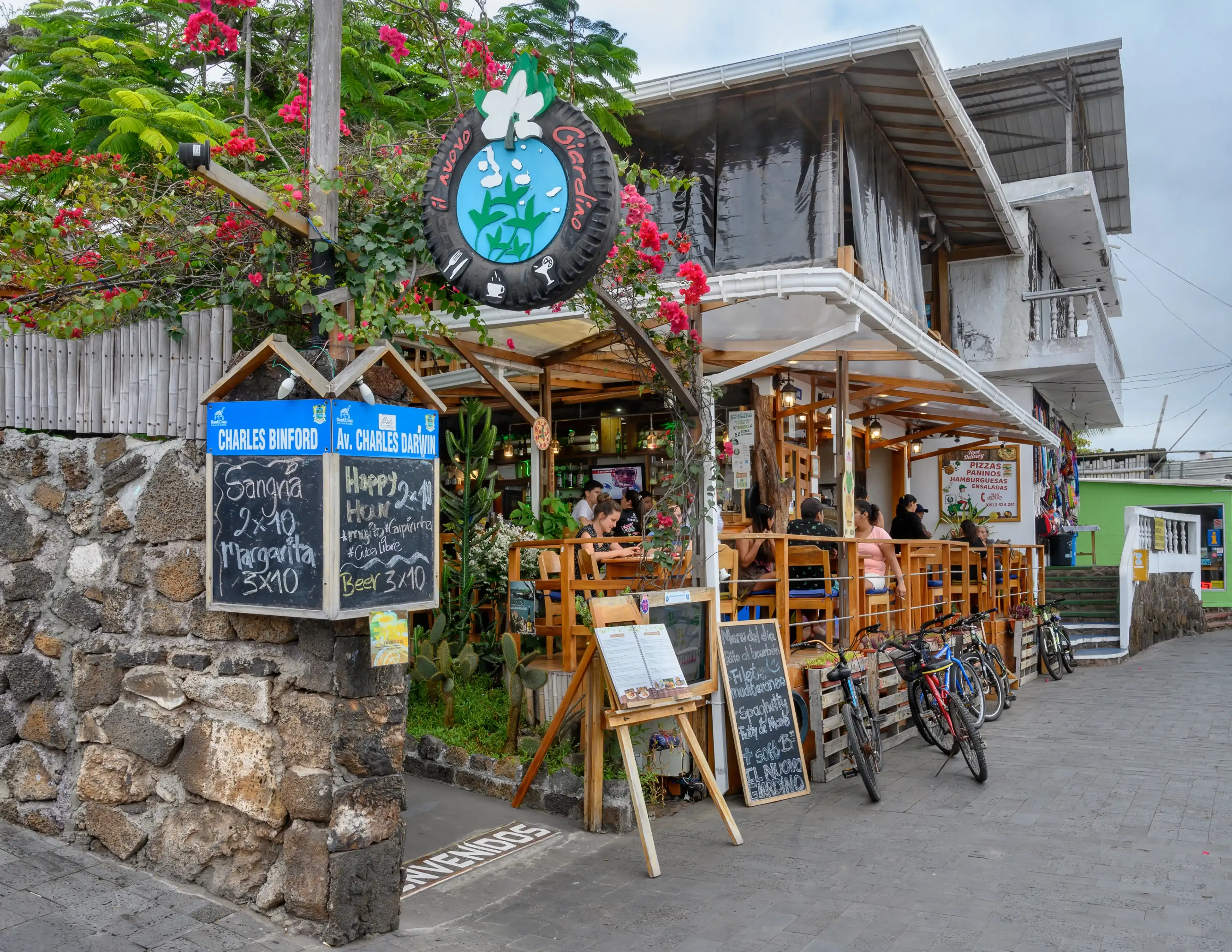GALAPAGOS, ECUADOR - AUGUST 30, 2019 : Restaurant on main street of Santa Cruz island in Galapagos, Ecuador. GALAPAGOS, ECUADOR - AUGUST 30, 2019 : Restaurant on main street of Santa Cruz island in Galapagos, Ecuador.