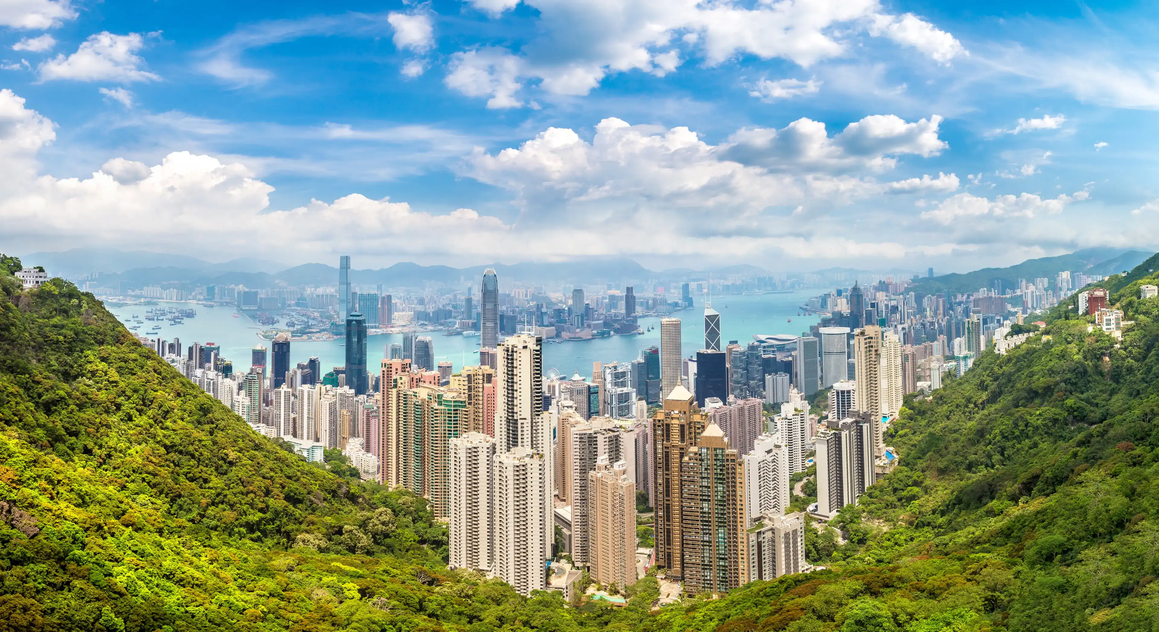 Panorama of Hong Kong business district in a summer day Panorama of Hong Kong business district in a summer day