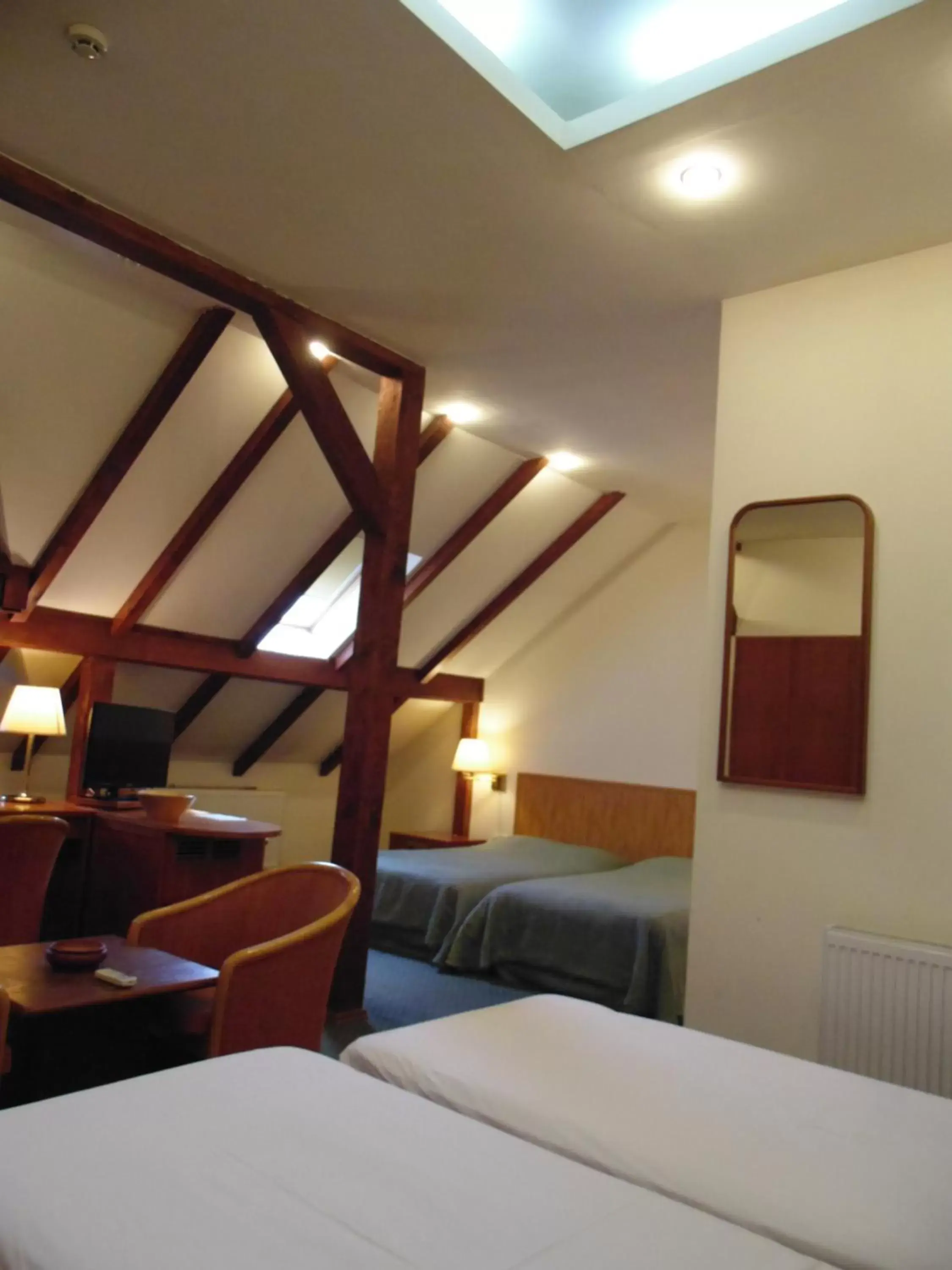 Standard Quadruple Room in Curtea Brasoveana Standard Quadruple Room in Curtea Brasoveana