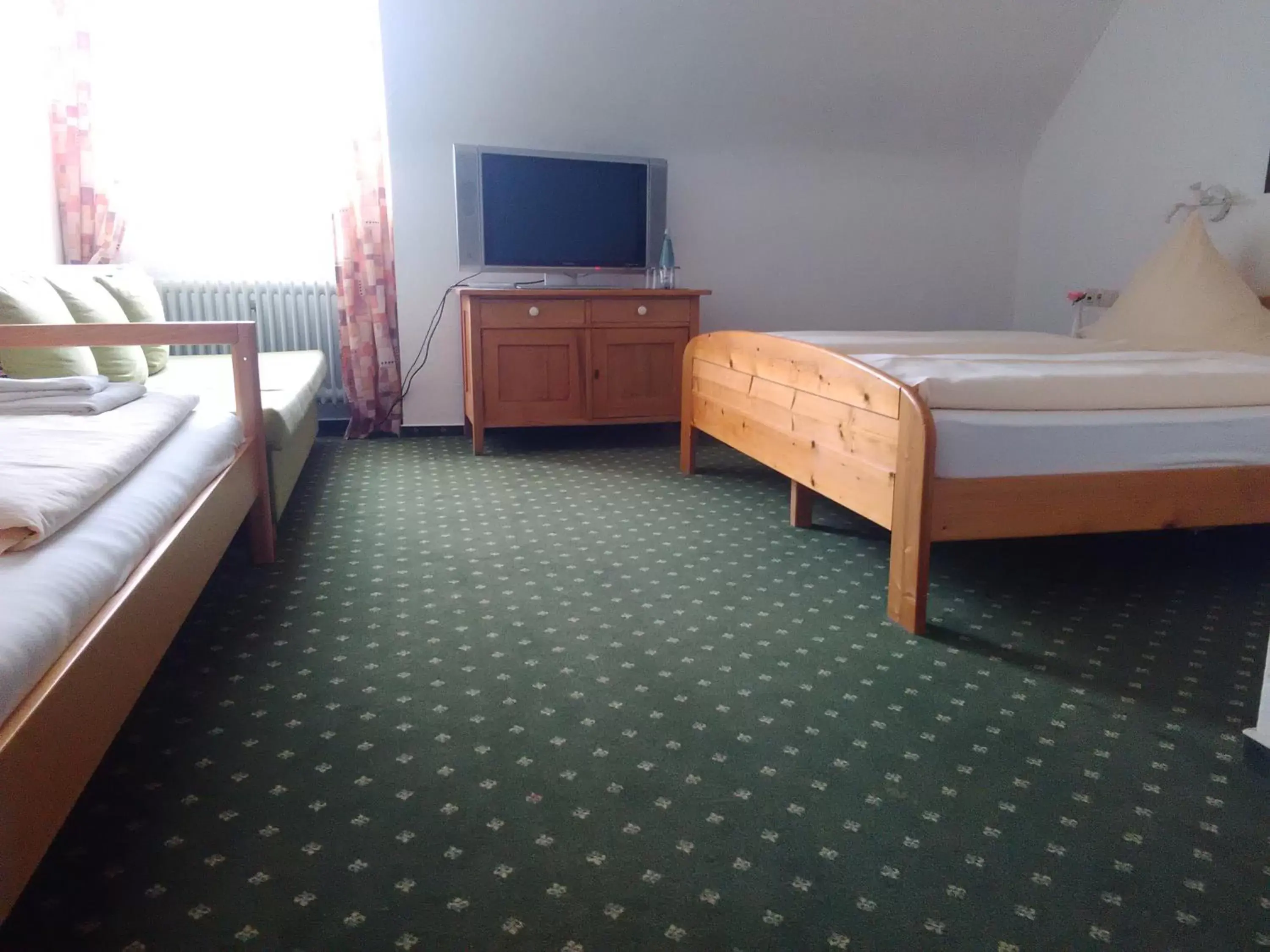 Standard Triple Room (2 Adults + 1 Child) in Pension Mühlencafe Standard Triple Room (2 Adults + 1 Child) in Pension Mühlencafe