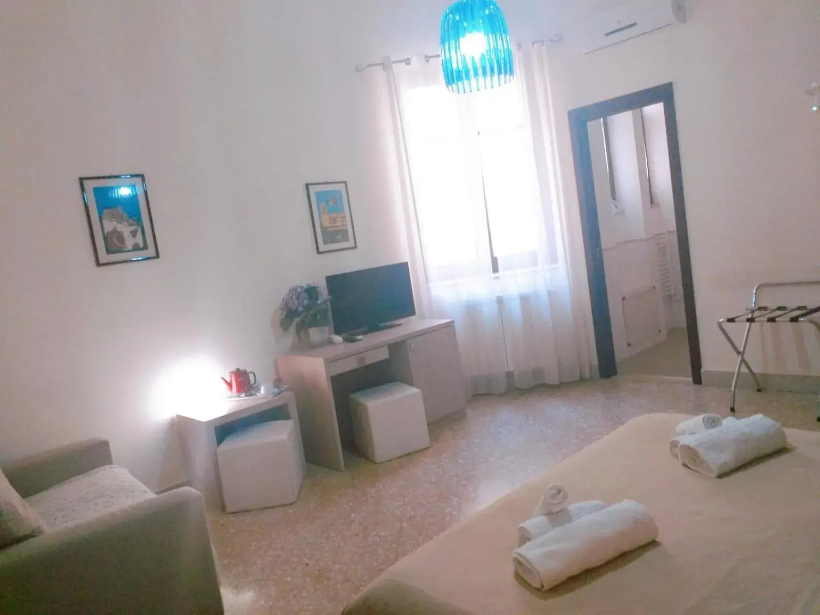 Triple Room in Il Quadrifoglio Room& Suite Triple Room in Il Quadrifoglio Room& Suite