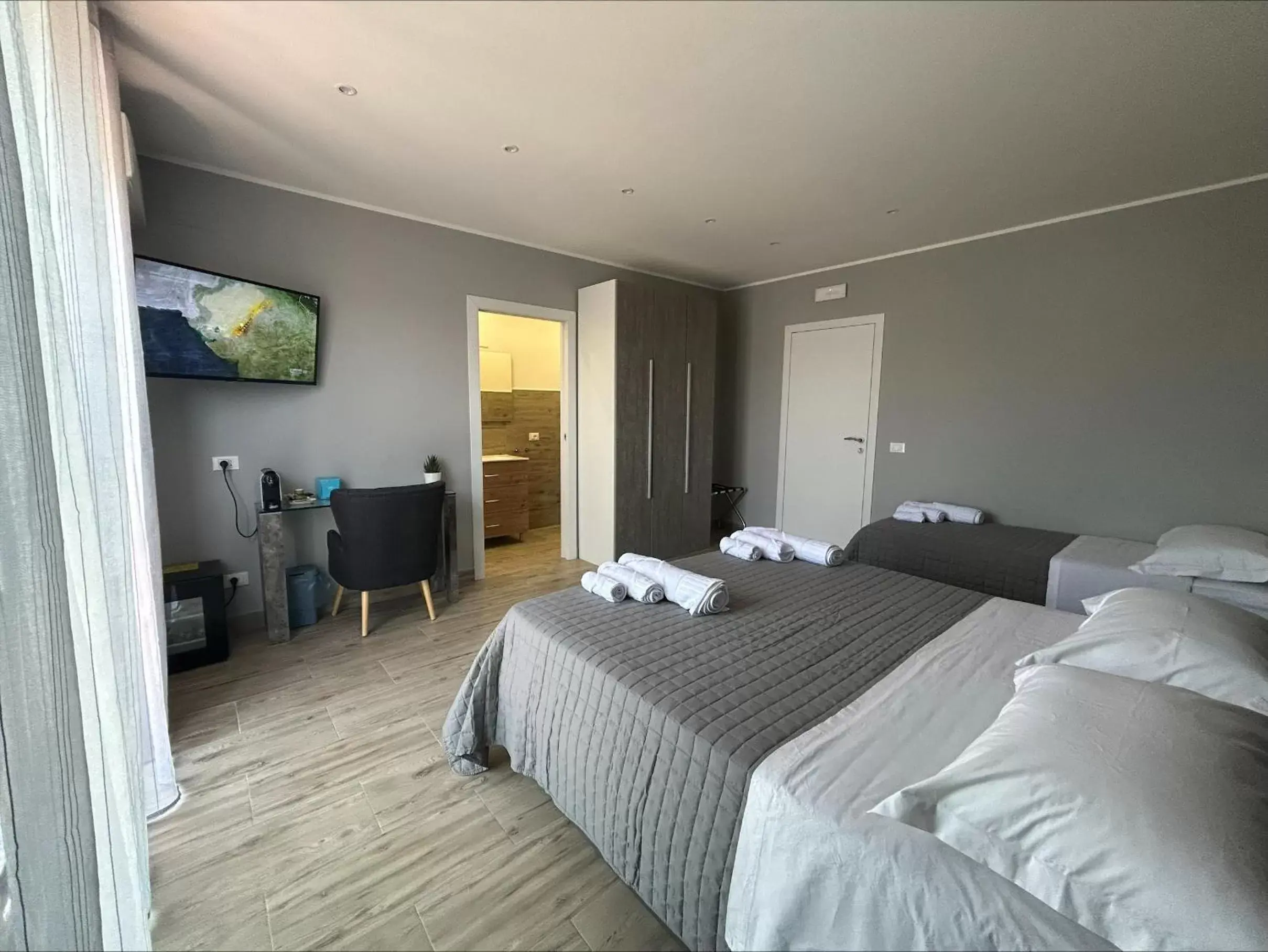 Triple Room with Terrace in Aqua B&B - Rooms and Apartments Triple Room with Terrace in Aqua B&B - Rooms and Apartments