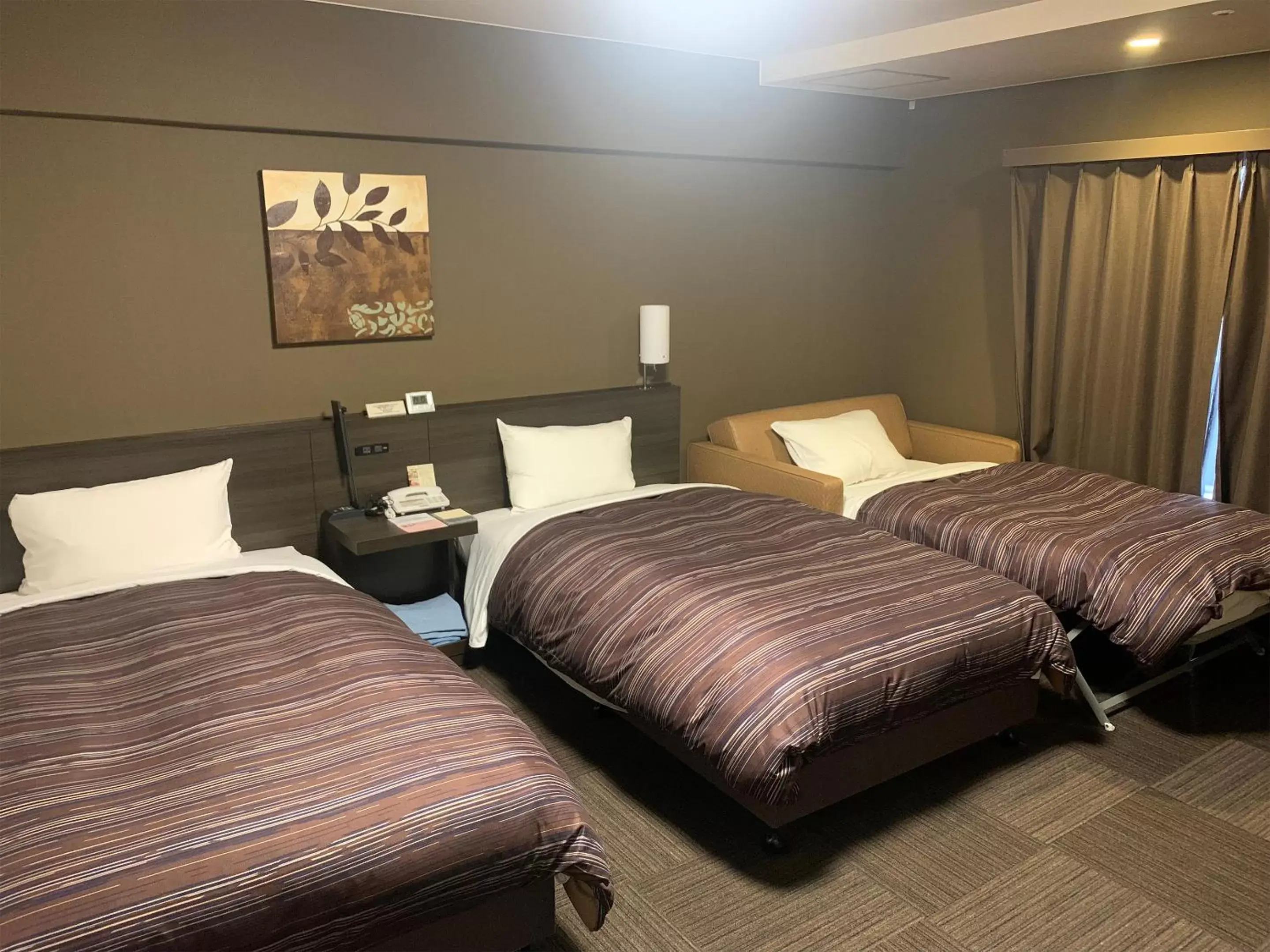 Triple Room - single occupancy - East Building - Non-Smoking in Hotel Route-Inn Kumamoto Ekimae Triple Room - single occupancy - East Building - Non-Smoking in Hotel Route-Inn Kumamoto Ekimae