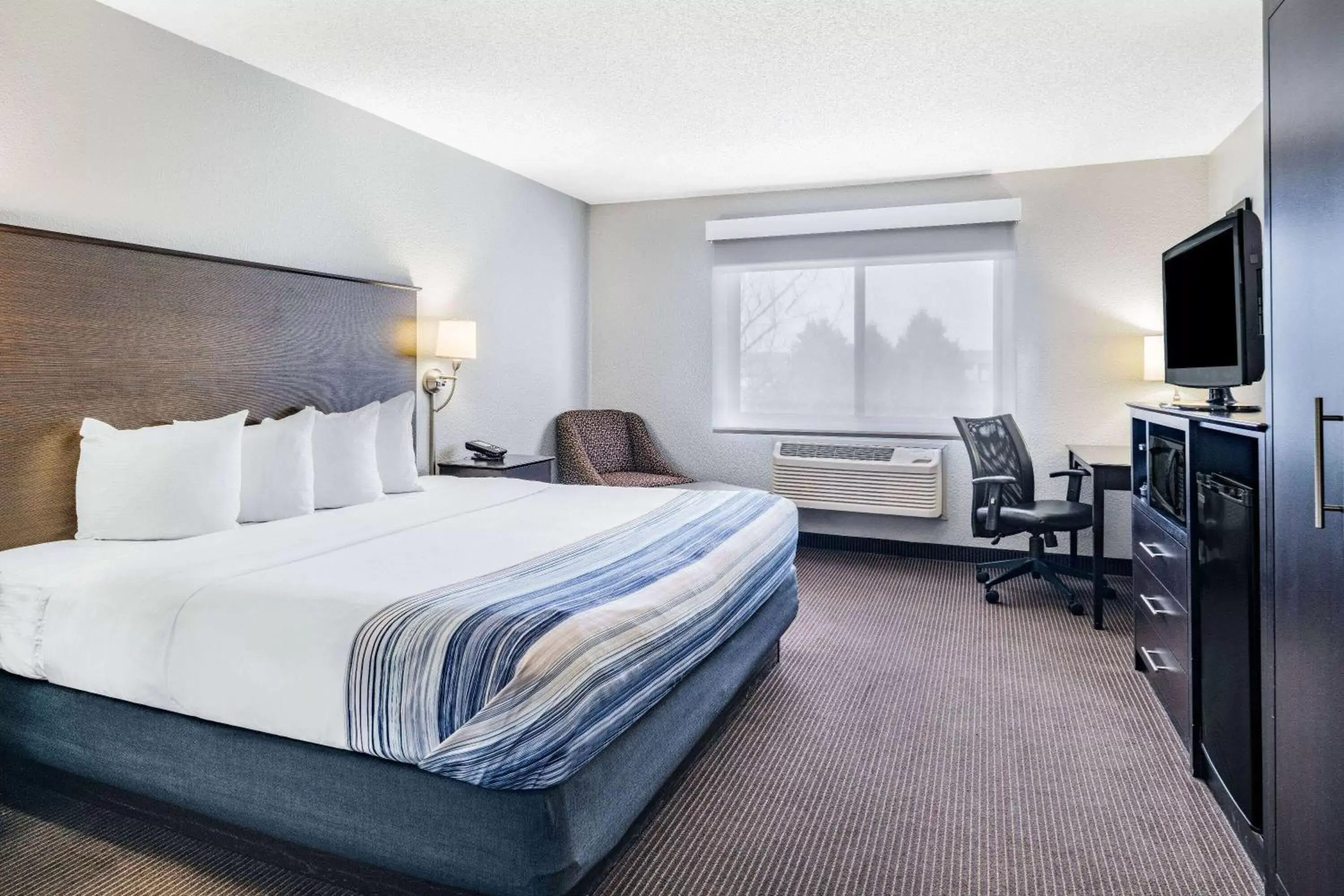 King Room - Non-Smoking in AmericInn by Wyndham Plover Stevens Point King Room - Non-Smoking in AmericInn by Wyndham Plover Stevens Point