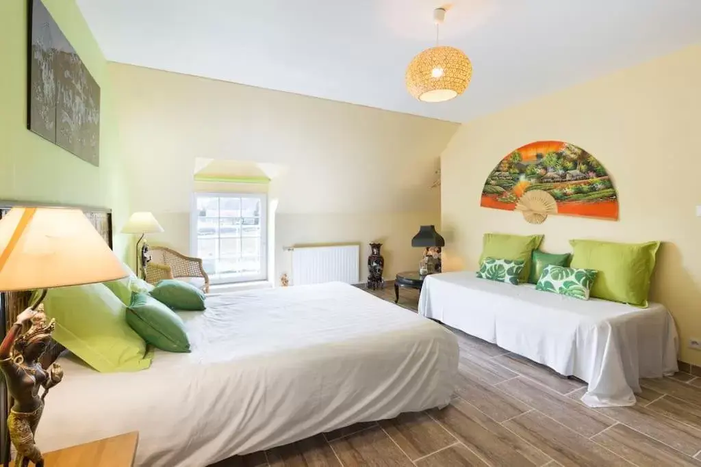 Deluxe Room (2 Adults + 1 Child) in Chambres d'hôtes - Les Palmiers Deluxe Room (2 Adults + 1 Child) in Chambres d'hôtes - Les Palmiers