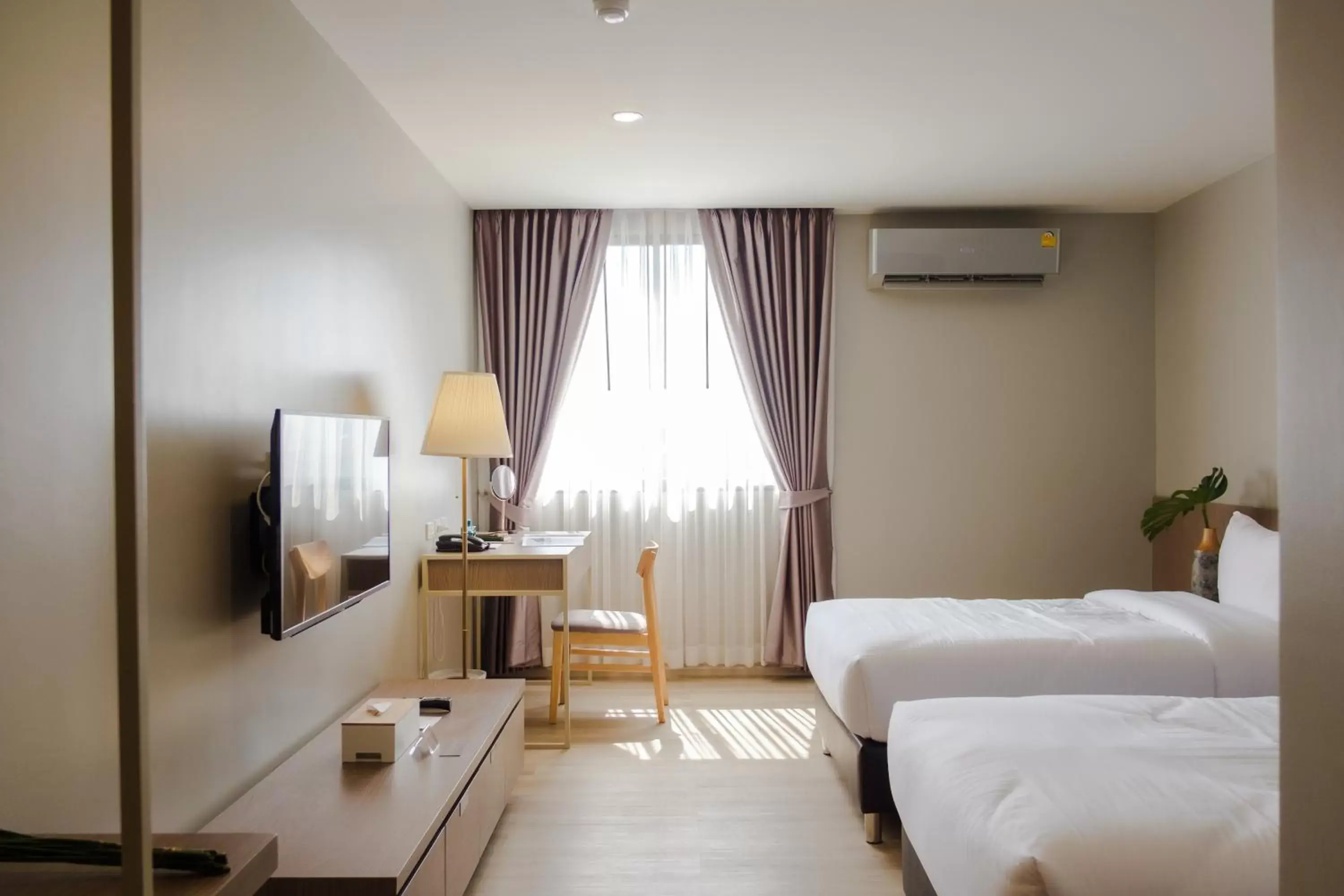 Deluxe Twin Room in The Rise Suites Hotel, Chiang Mai - SHA Extra Plus Deluxe Twin Room in The Rise Suites Hotel, Chiang Mai - SHA Extra Plus