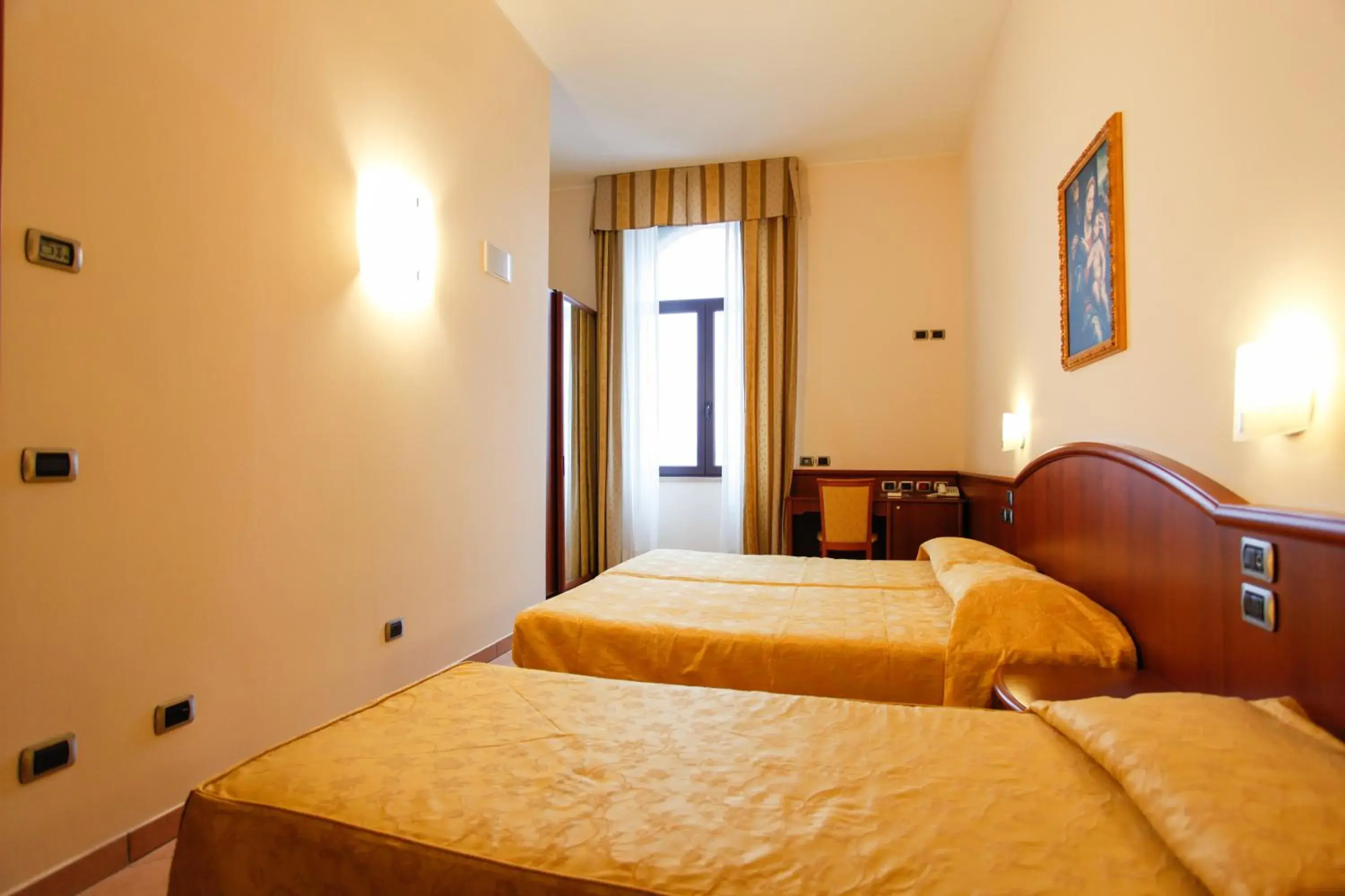 Superior Triple Room in Garda Family House Superior Triple Room in Garda Family House