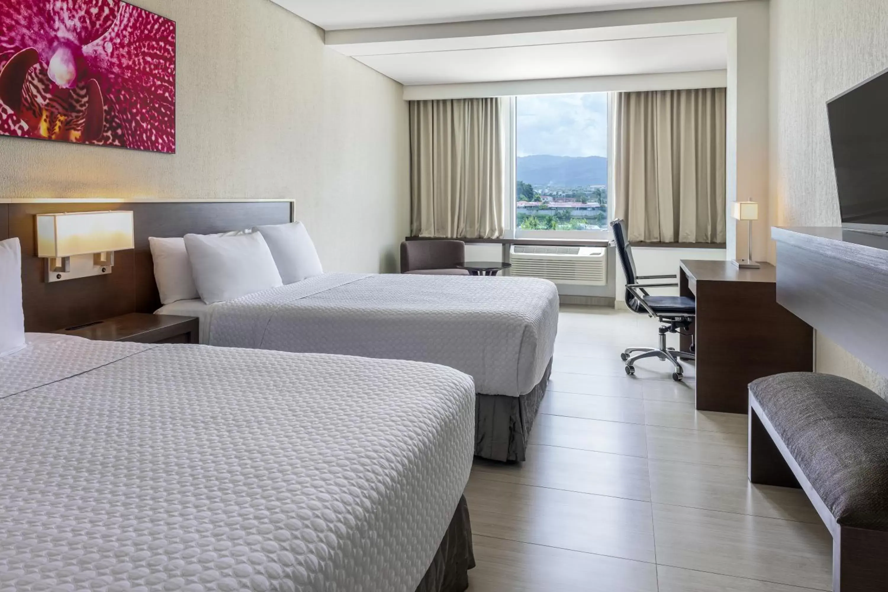 Standard Queen Room with Two Queen Beds in Crowne Plaza Airport by IHG Standard Queen Room with Two Queen Beds in Crowne Plaza Airport by IHG