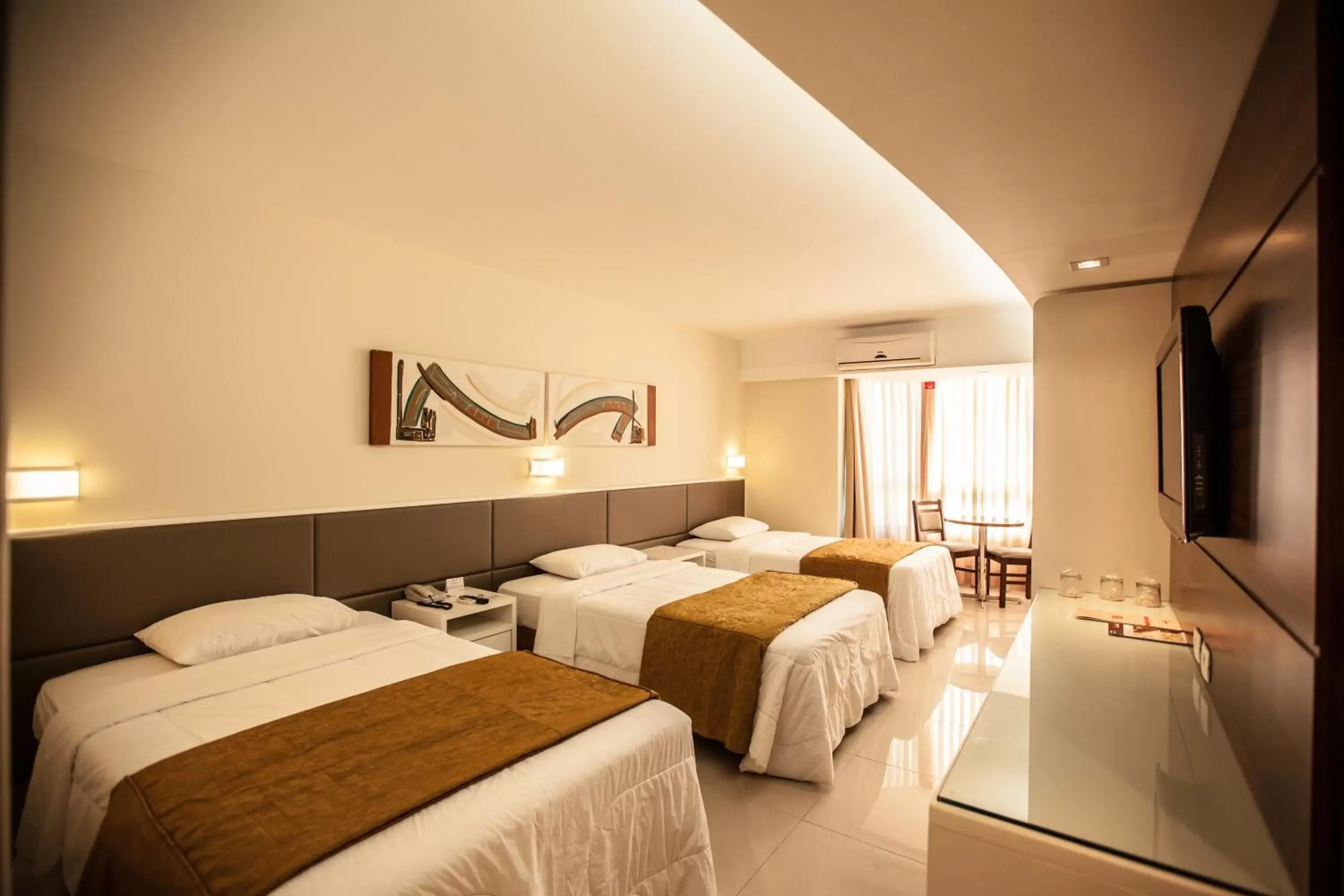 Deluxe Triple Room in Rafain Palace Hotel & Convention Center Deluxe Triple Room in Rafain Palace Hotel & Convention Center