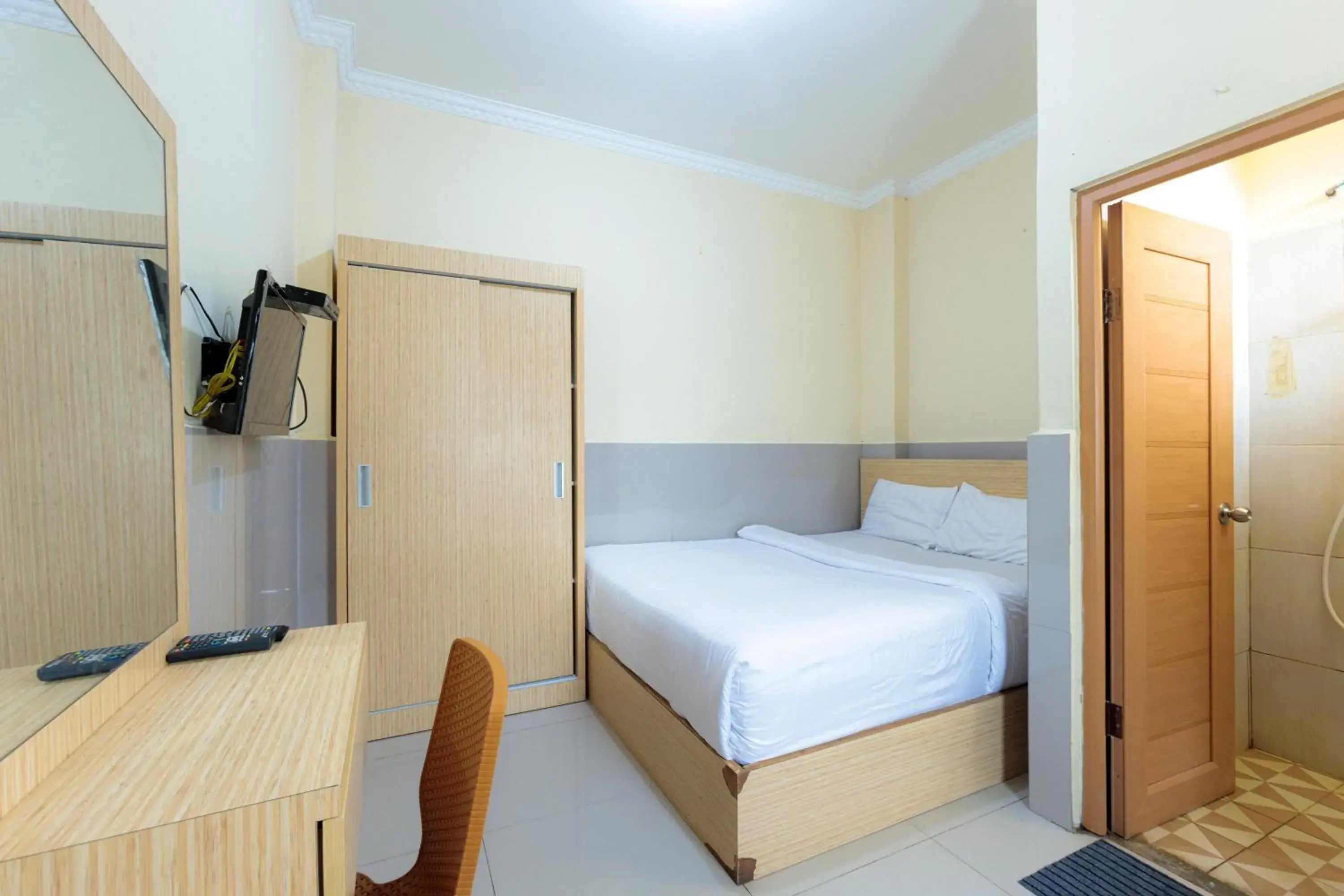 Bed in Super OYO 1524 D' Paseban Bed in Super OYO 1524 D' Paseban