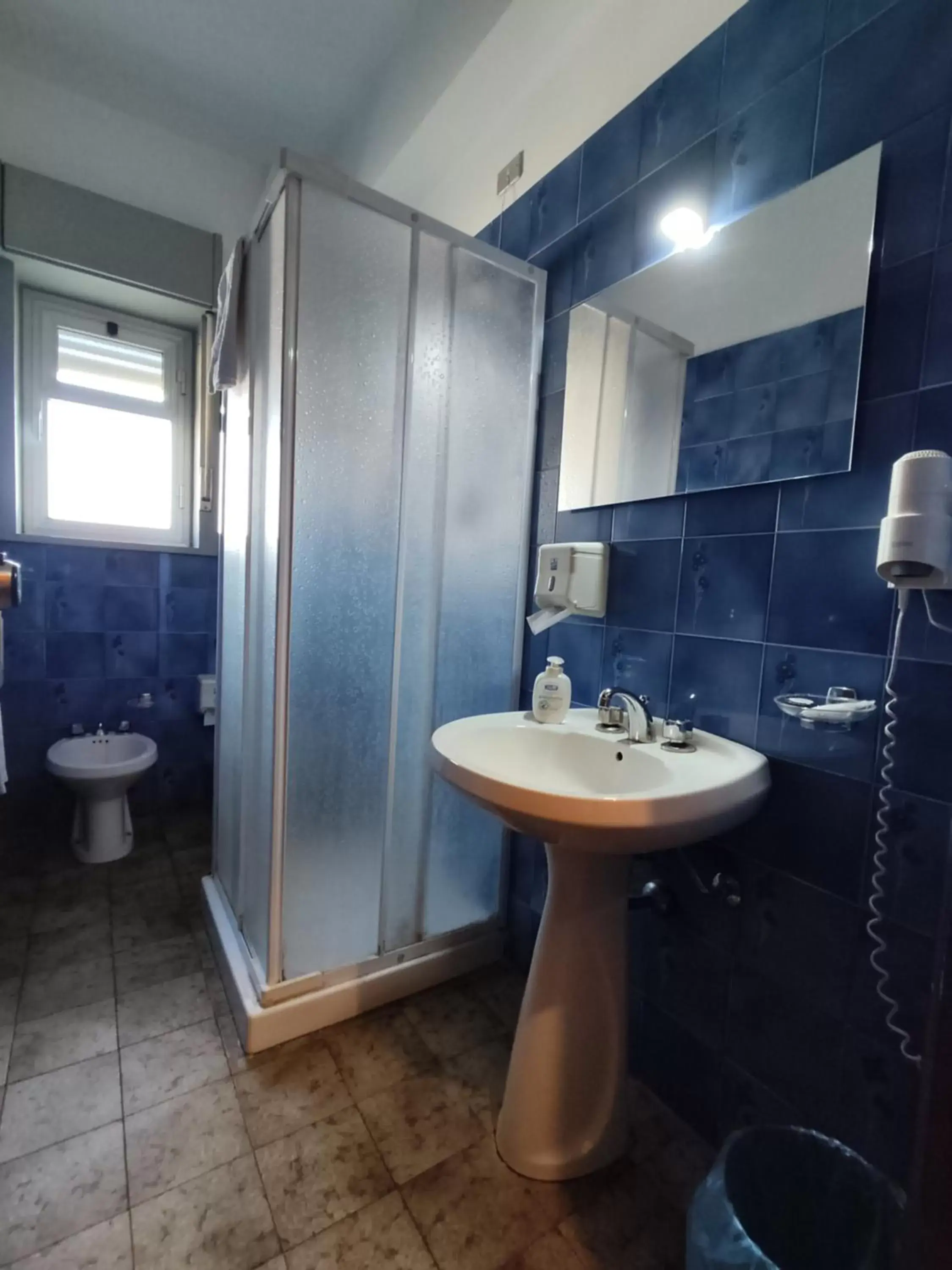 Quadruple Room with Balcony in Hotel Il Dollaro Quadruple Room with Balcony in Hotel Il Dollaro