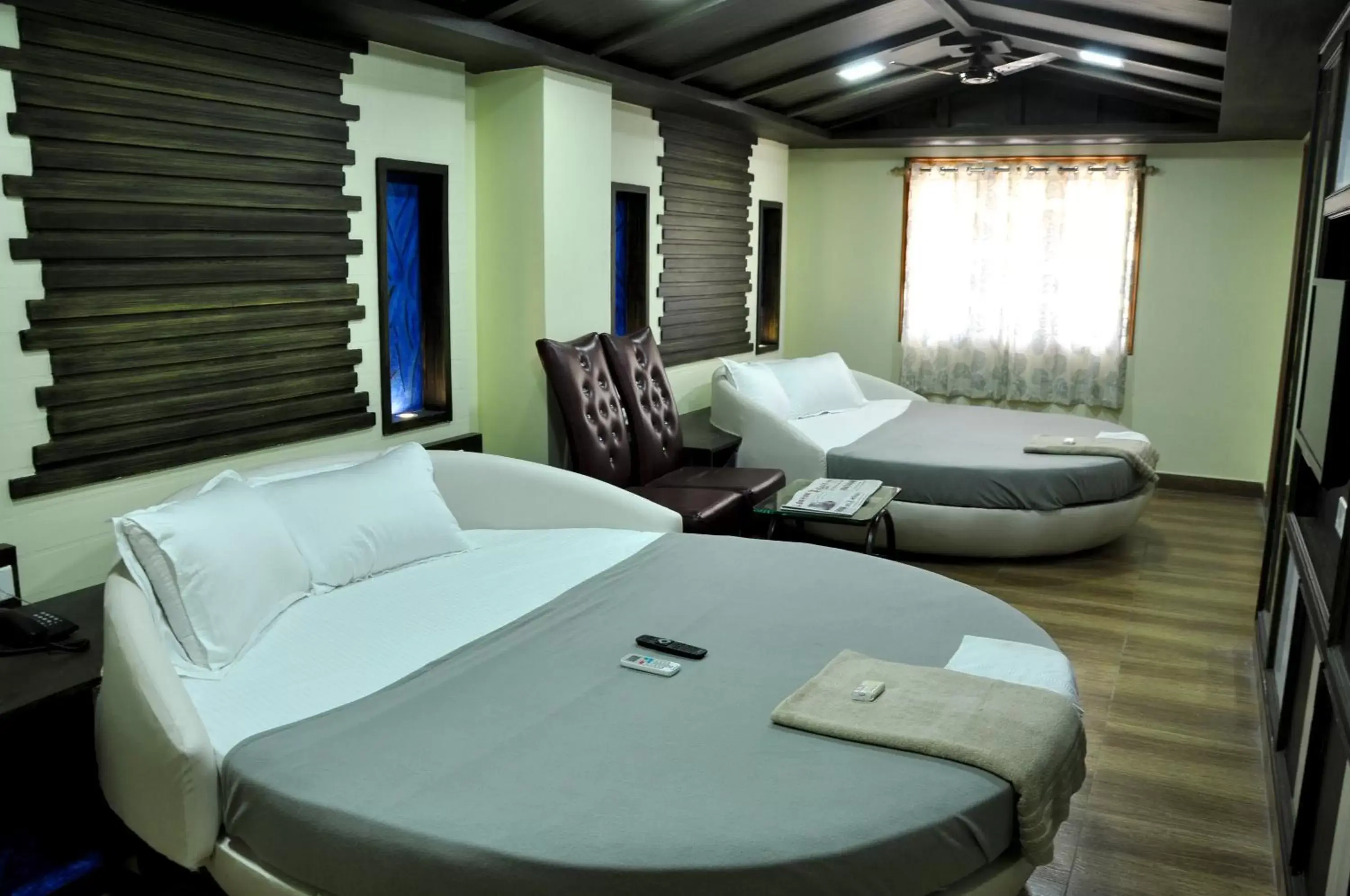 Premium Quadruple Room in Hotel Anandhiram Heritage Premium Quadruple Room in Hotel Anandhiram Heritage