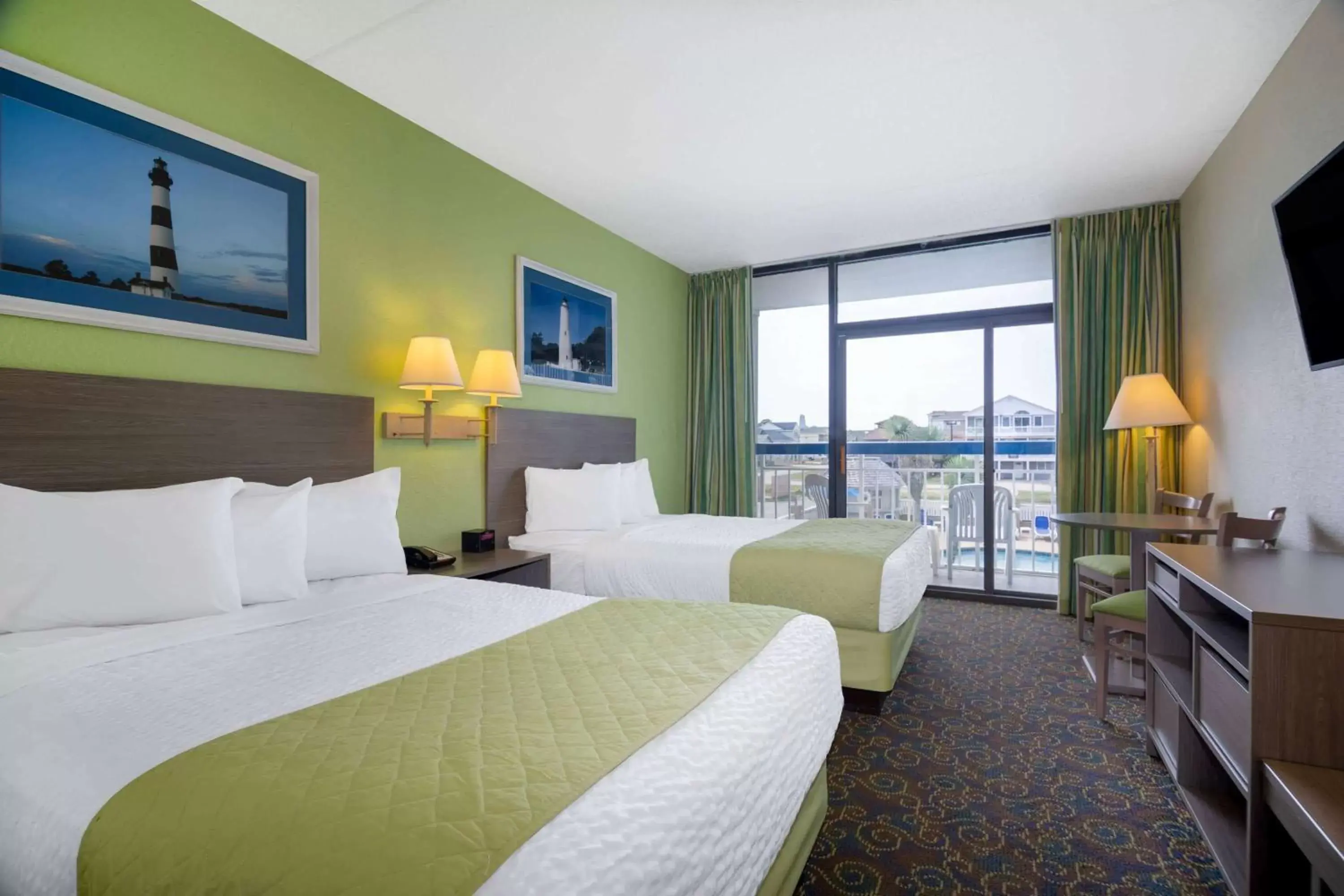 Queen Room with Two Queen Beds with Pool View- Smoking in Travelodge by Wyndham Outer Banks/Kill Devil Hills Queen Room with Two Queen Beds with Pool View- Smoking in Travelodge by Wyndham Outer Banks/Kill Devil Hills