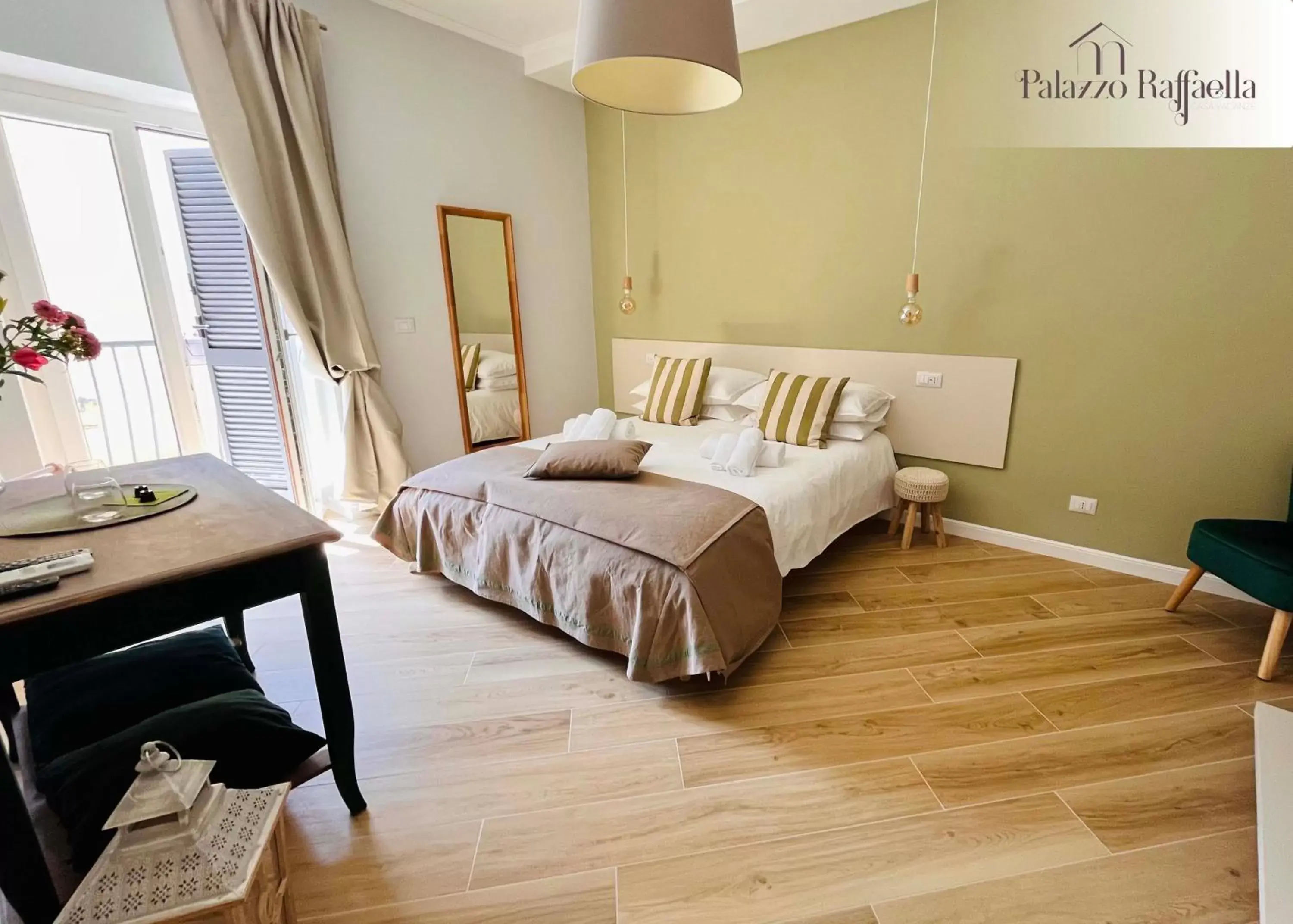 Photo of the whole room, Bed in Palazzo Raffaella Casa vacanze Photo of the whole room, Bed in Palazzo Raffaella Casa vacanze