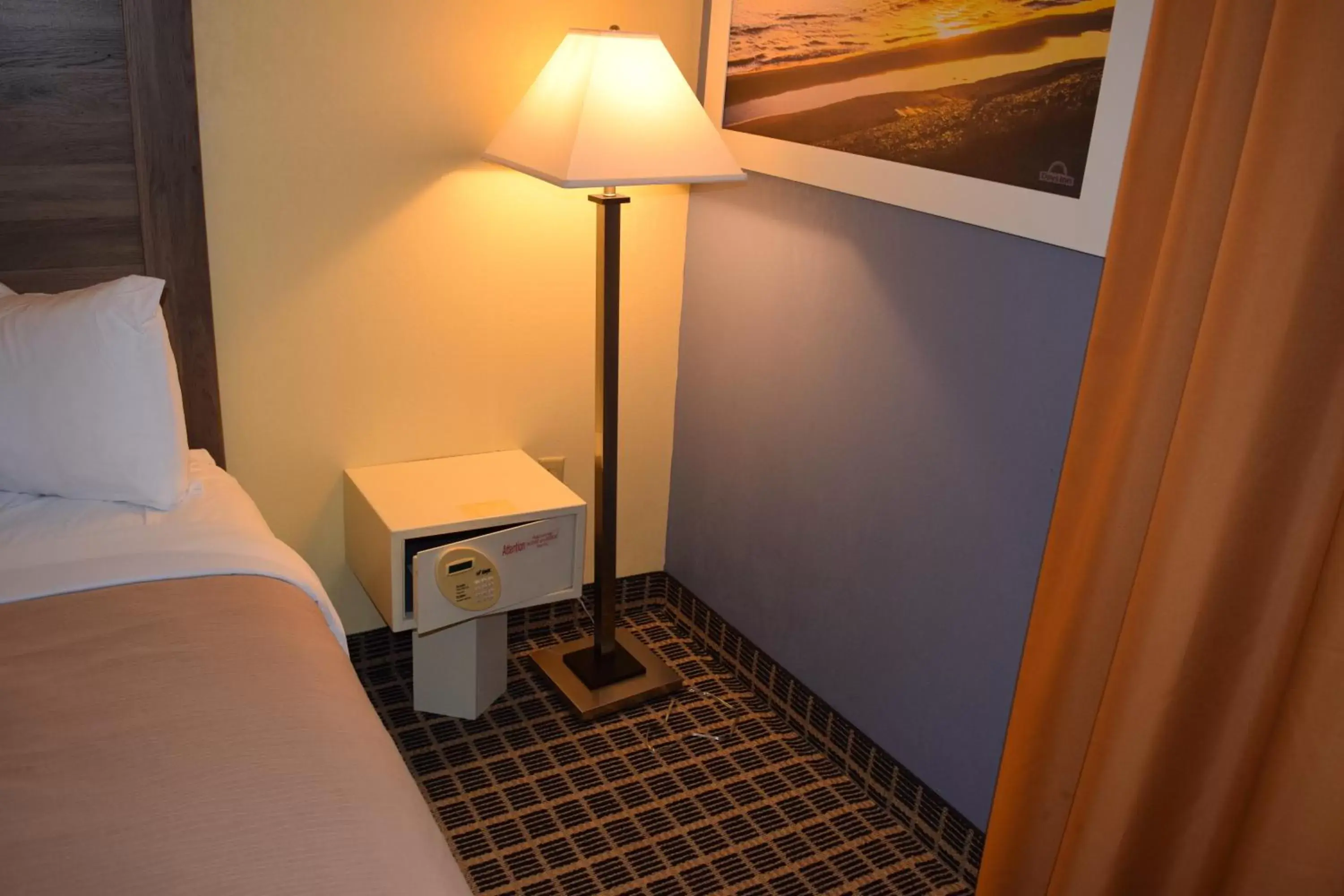 Queen Room with Two Queen Beds - Mobility Access/Non-Smoking in Days Inn by Wyndham Cadillac Queen Room with Two Queen Beds - Mobility Access/Non-Smoking in Days Inn by Wyndham Cadillac