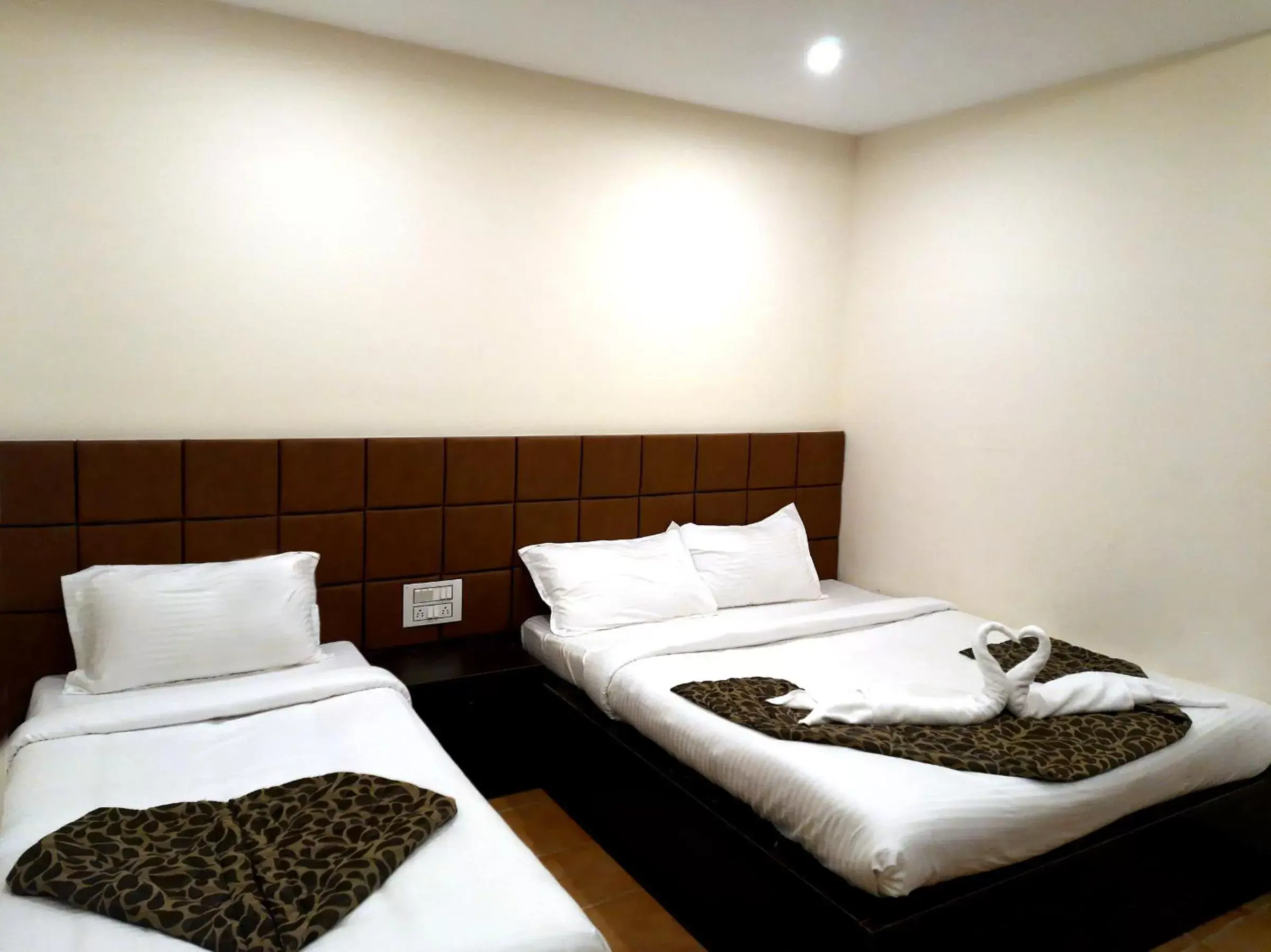 Deluxe Triple Room in GRAND KODAI SR INN Deluxe Triple Room in GRAND KODAI SR INN