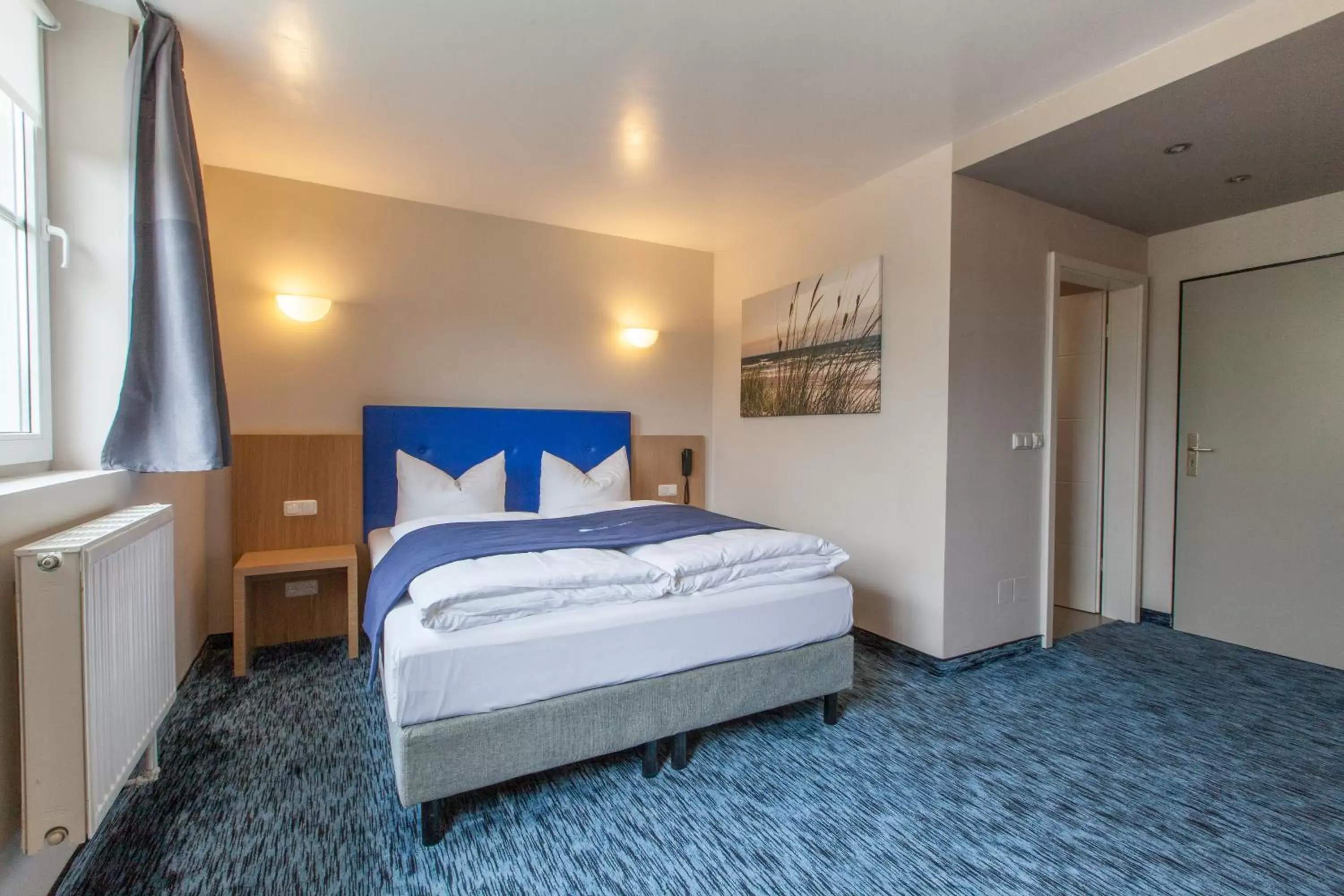 Triple Room in Hotel am Fjord Triple Room in Hotel am Fjord