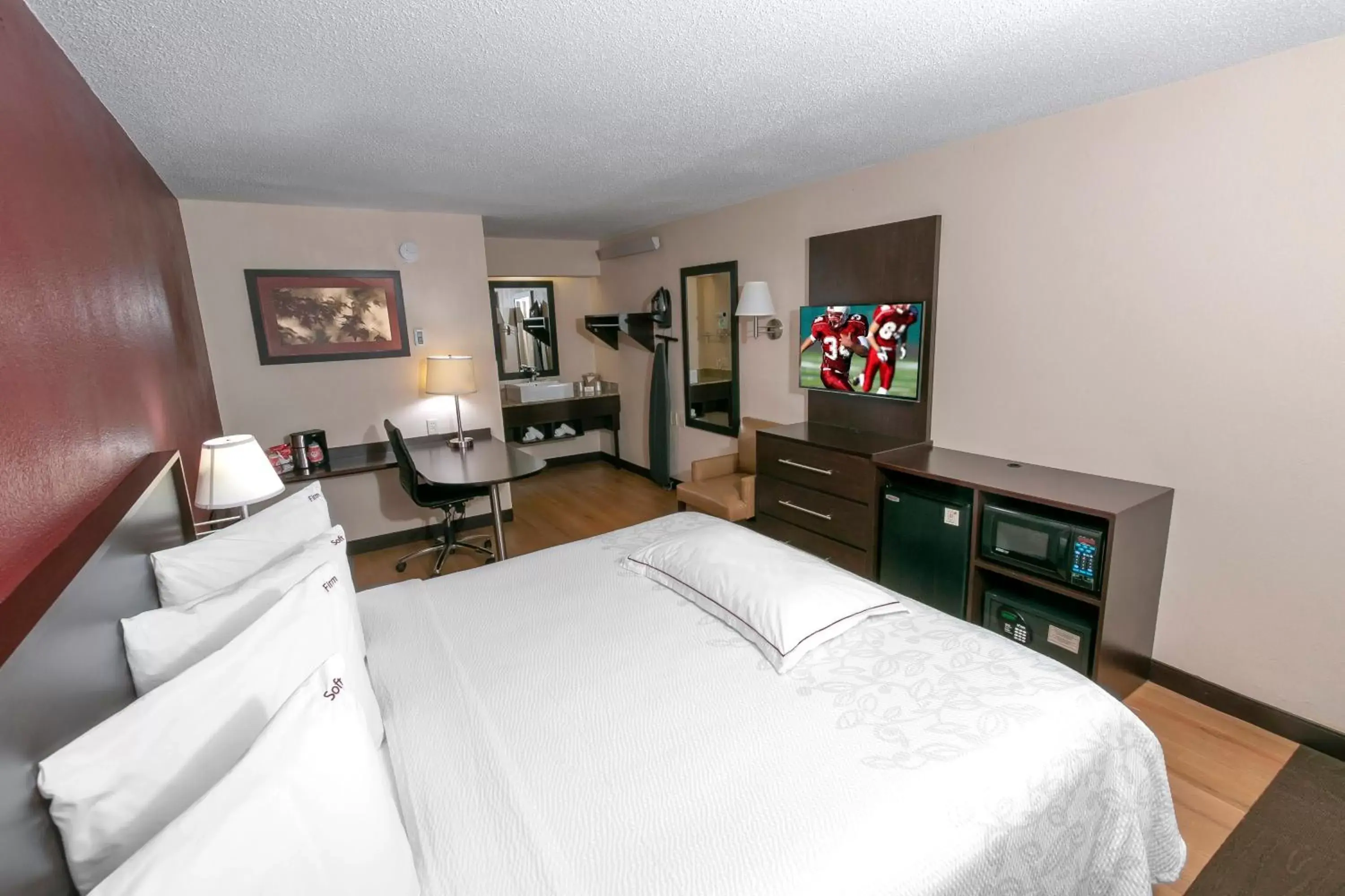 Premium King Room Smoke Free (Upgraded Bedding & Snack Box) in Red Roof Inn PLUS+ University at Buffalo - Amherst Premium King Room Smoke Free (Upgraded Bedding & Snack Box) in Red Roof Inn PLUS+ University at Buffalo - Amherst