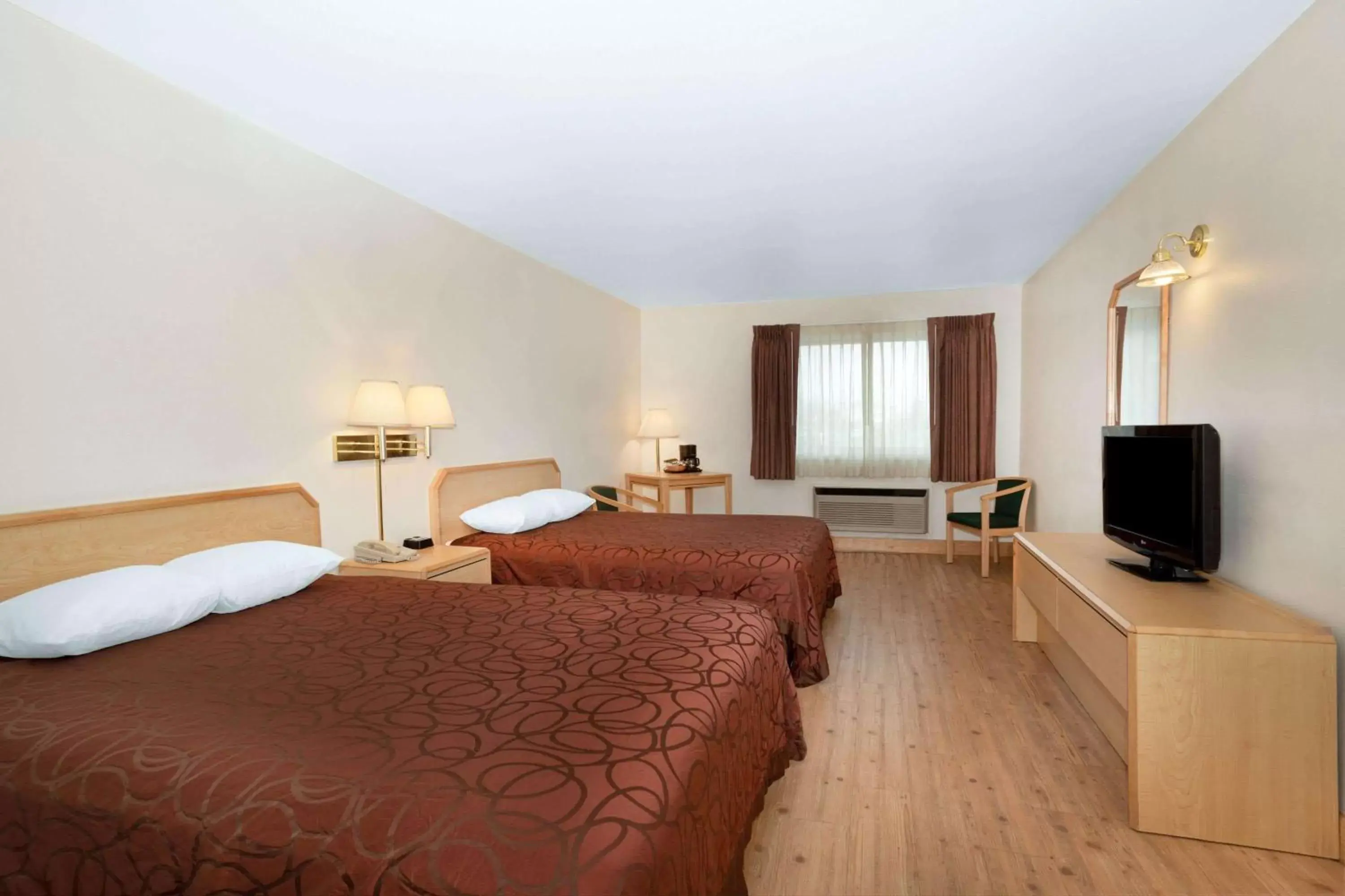 Queen Room with Two Queen Beds - Non-Smoking in Inn at Lander, Travelodge by Wyndham Queen Room with Two Queen Beds - Non-Smoking in Inn at Lander, Travelodge by Wyndham