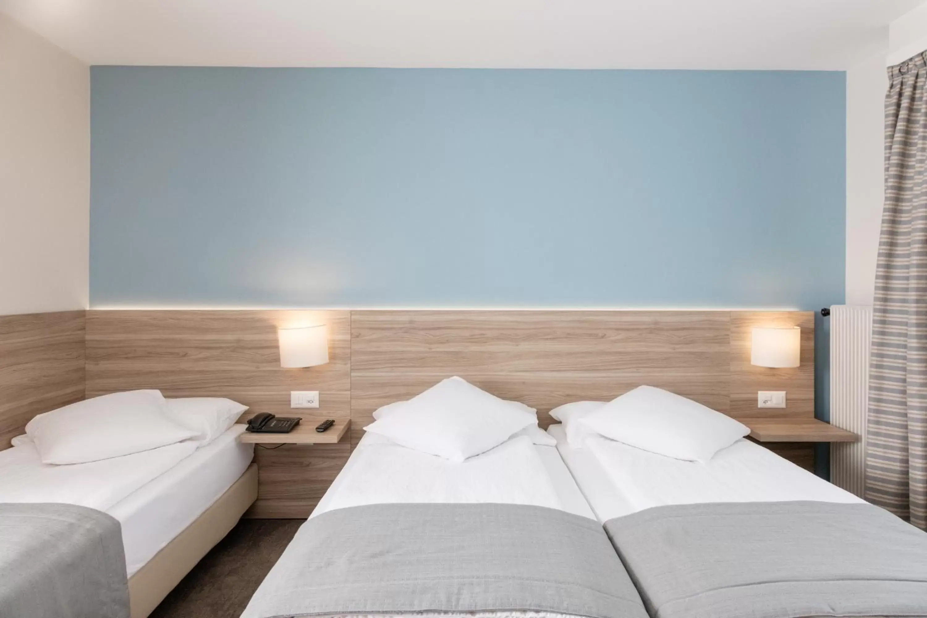 Classic Triple Room in Hôtel de Chailly Classic Triple Room in Hôtel de Chailly