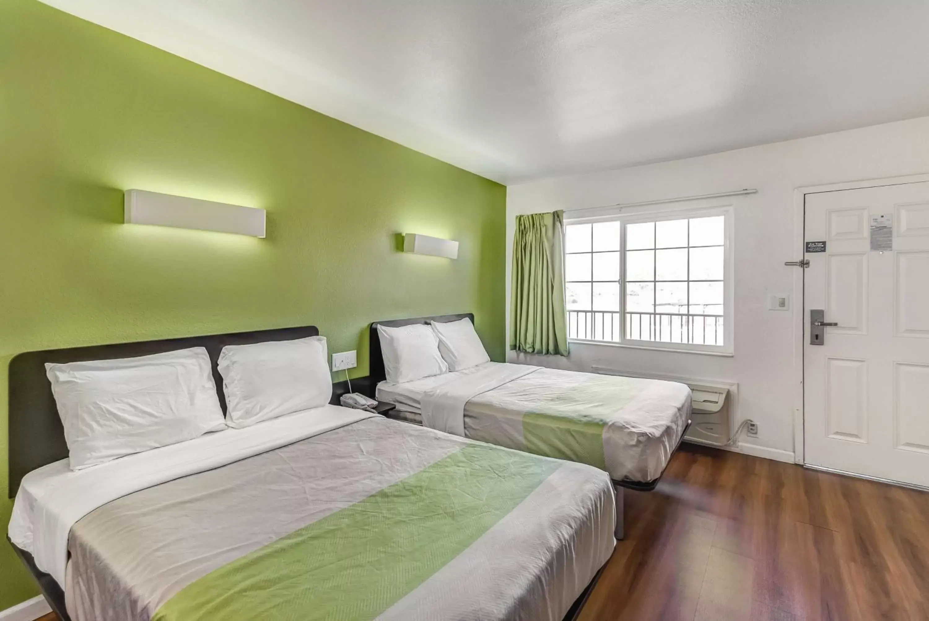 Deluxe Queen Room with Two Queen Beds - single occupancy - Non-Smoking in Motel 6-Visalia, CA Deluxe Queen Room with Two Queen Beds - single occupancy - Non-Smoking in Motel 6-Visalia, CA