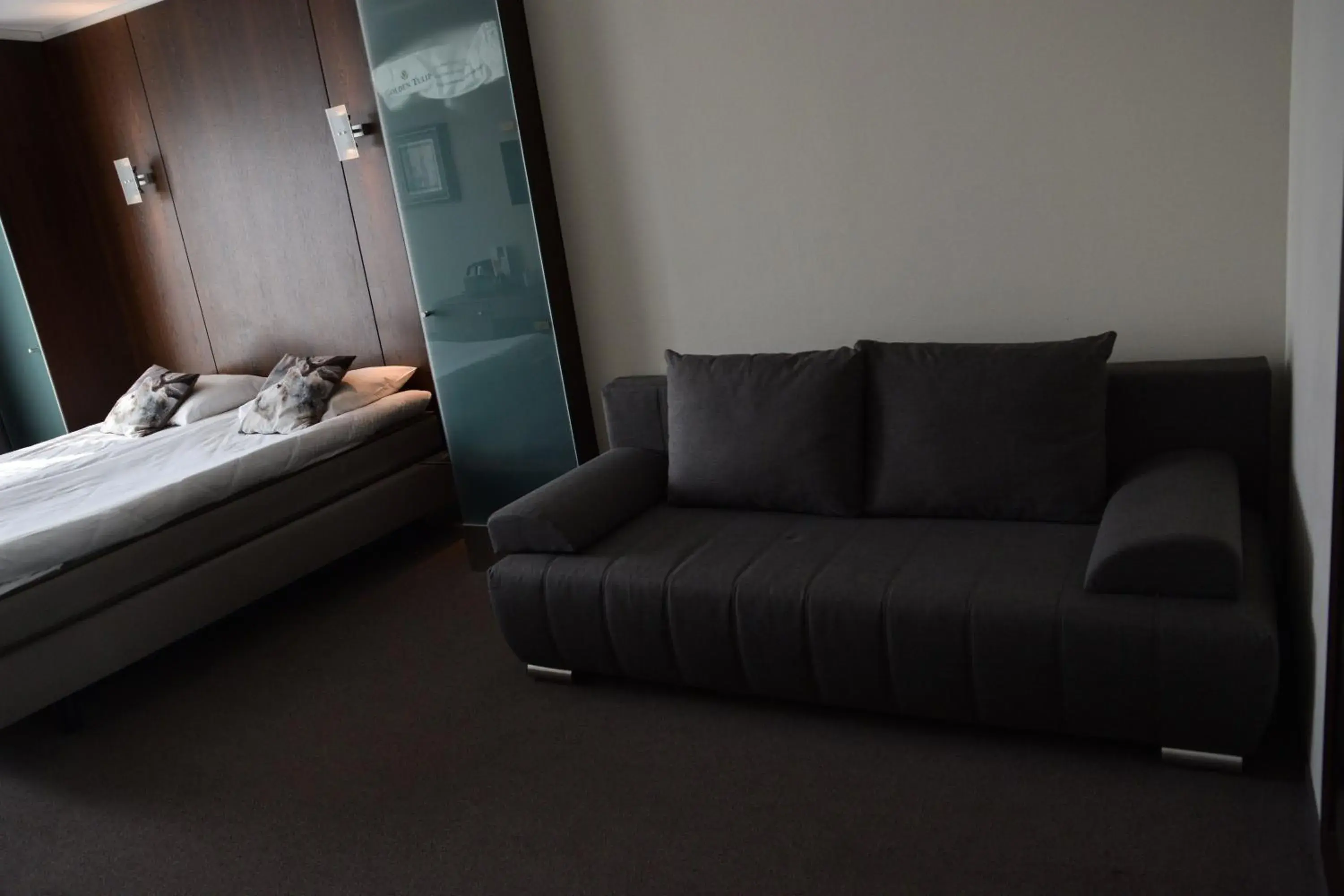 Junior Suite - 2 Single Beds 1 Sofa Bed in Golden Tulip West Ende Junior Suite - 2 Single Beds 1 Sofa Bed in Golden Tulip West Ende