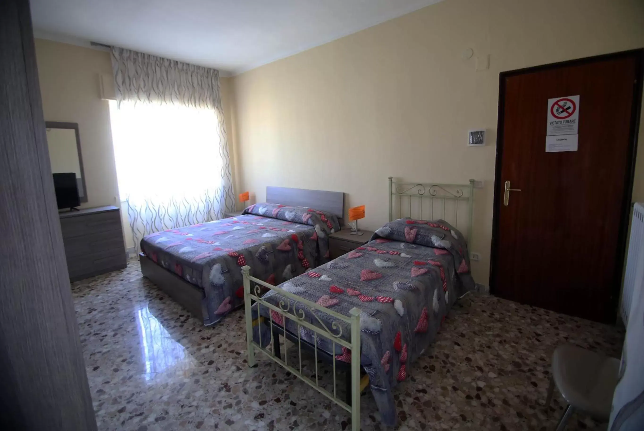 Deluxe Room (2 Adults + 1 Child) in B&B Le Perle Deluxe Room (2 Adults + 1 Child) in B&B Le Perle