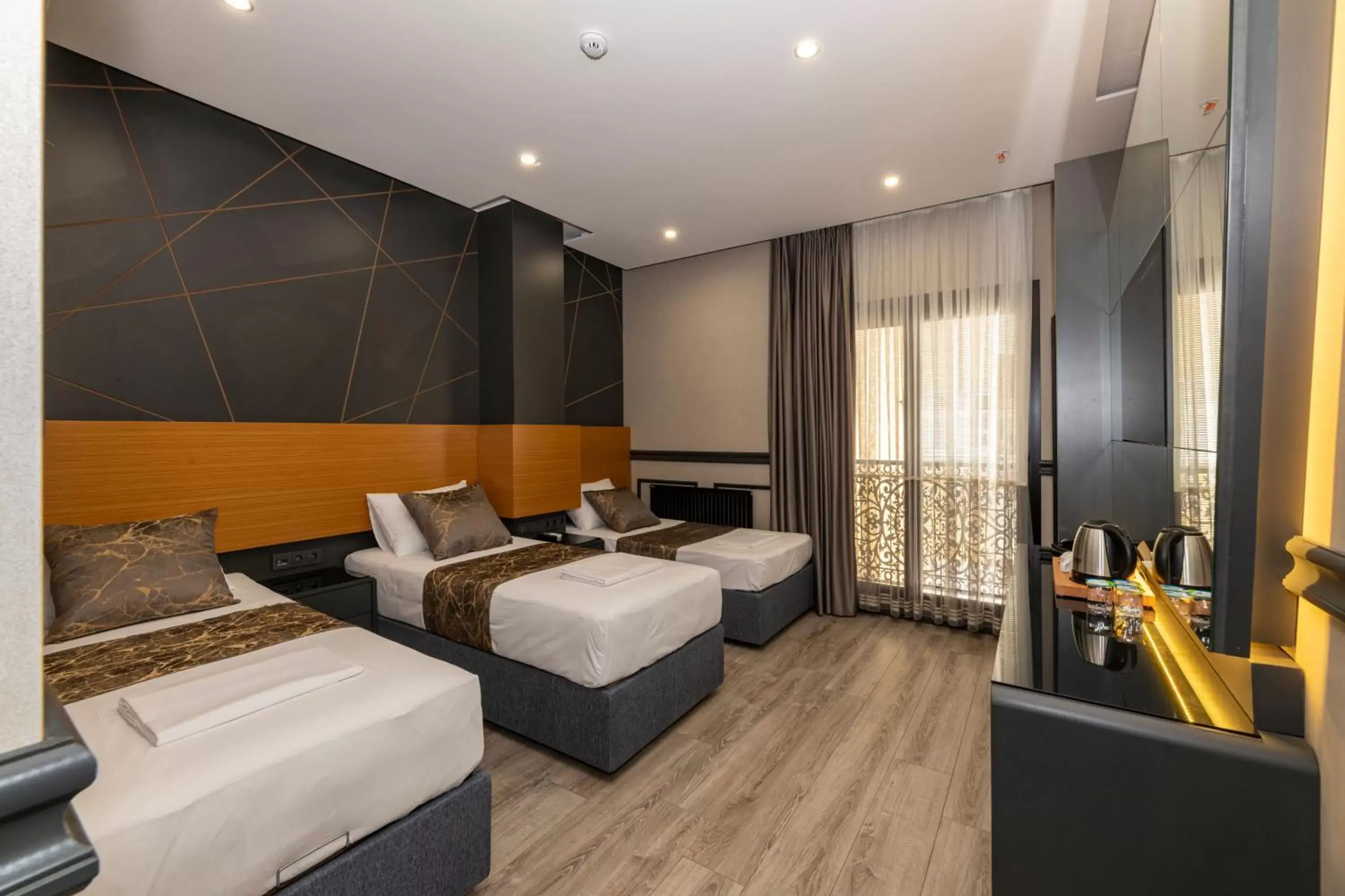 Deluxe Triple Room in Confores Hotel Deluxe Triple Room in Confores Hotel