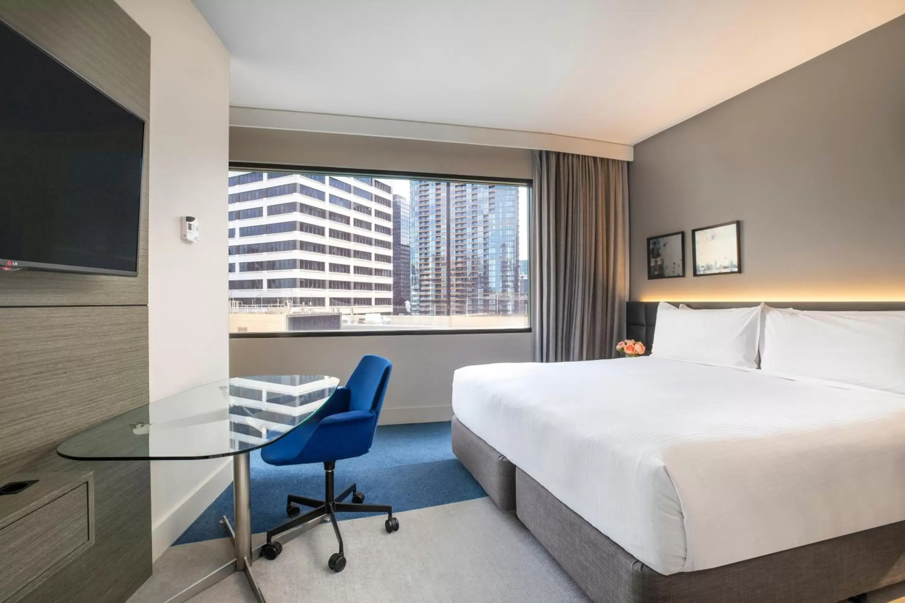 Family Room with One King Bed, Two Double Beds and River View in Crowne Plaza Melbourne, an IHG Hotel Family Room with One King Bed, Two Double Beds and River View in Crowne Plaza Melbourne, an IHG Hotel