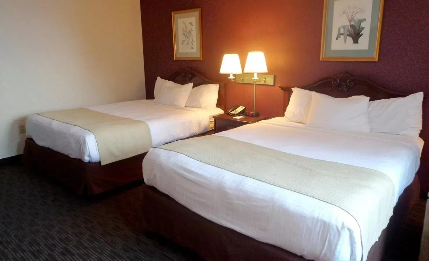 Queen Room with Two Queen Beds in AmericInn by Wyndham Marshall Queen Room with Two Queen Beds in AmericInn by Wyndham Marshall