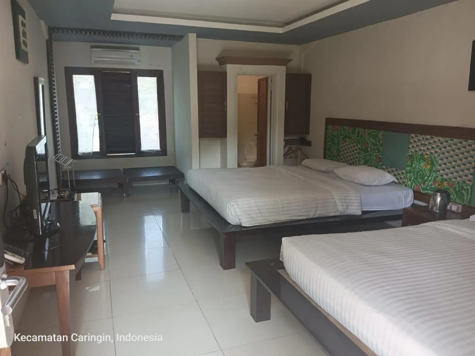 Deluxe Double Room in The Village Resort Bogor By Waringin Hospitality Deluxe Double Room in The Village Resort Bogor By Waringin Hospitality