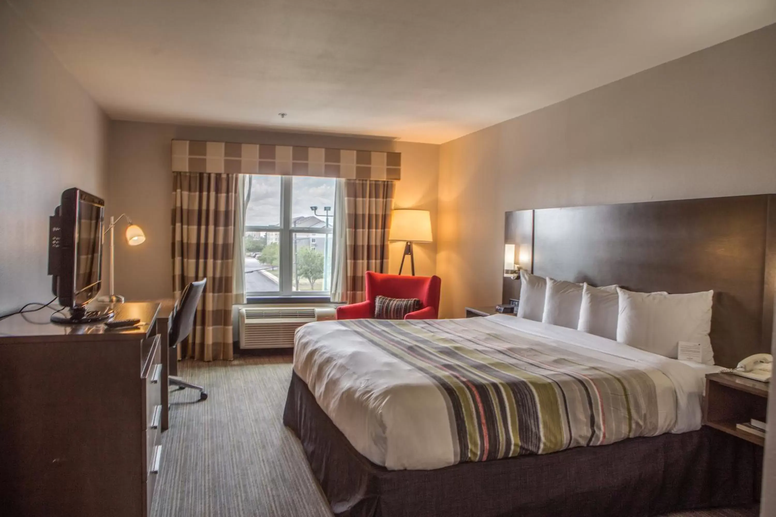 King Room with Roll-In Shower - Disability Access in Country Inn & Suites by Radisson, Harlingen, TX King Room with Roll-In Shower - Disability Access in Country Inn & Suites by Radisson, Harlingen, TX