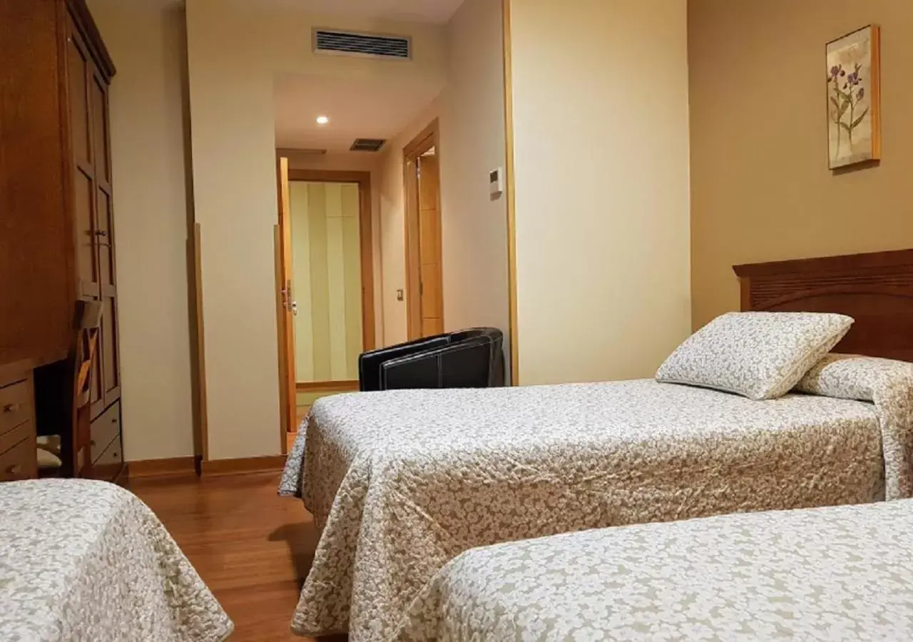 Triple Room in Hotel Reina Isabel Triple Room in Hotel Reina Isabel