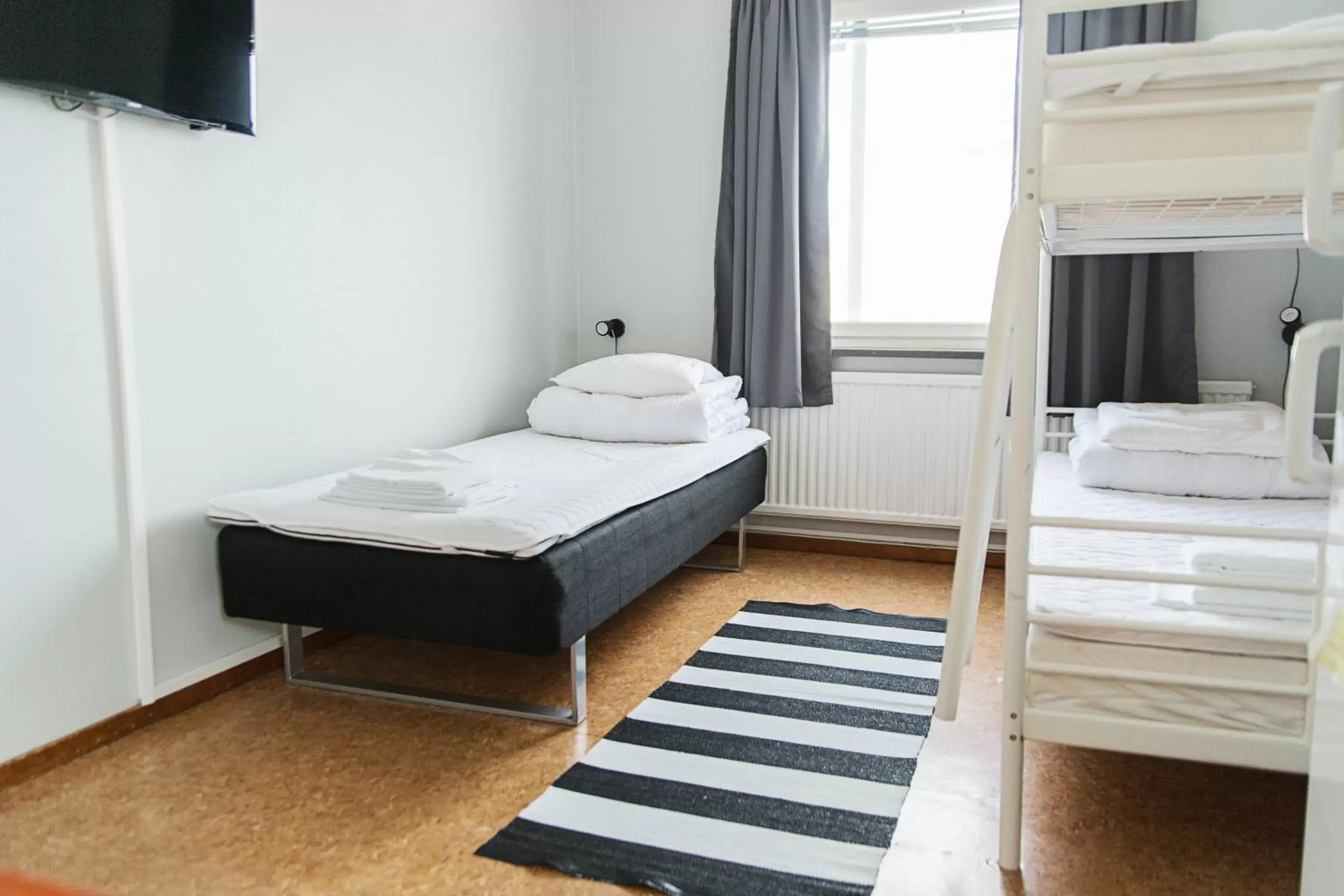 Economy Triple Room with Shared Bathroom in SPiS Hotel & Hostel Economy Triple Room with Shared Bathroom in SPiS Hotel & Hostel