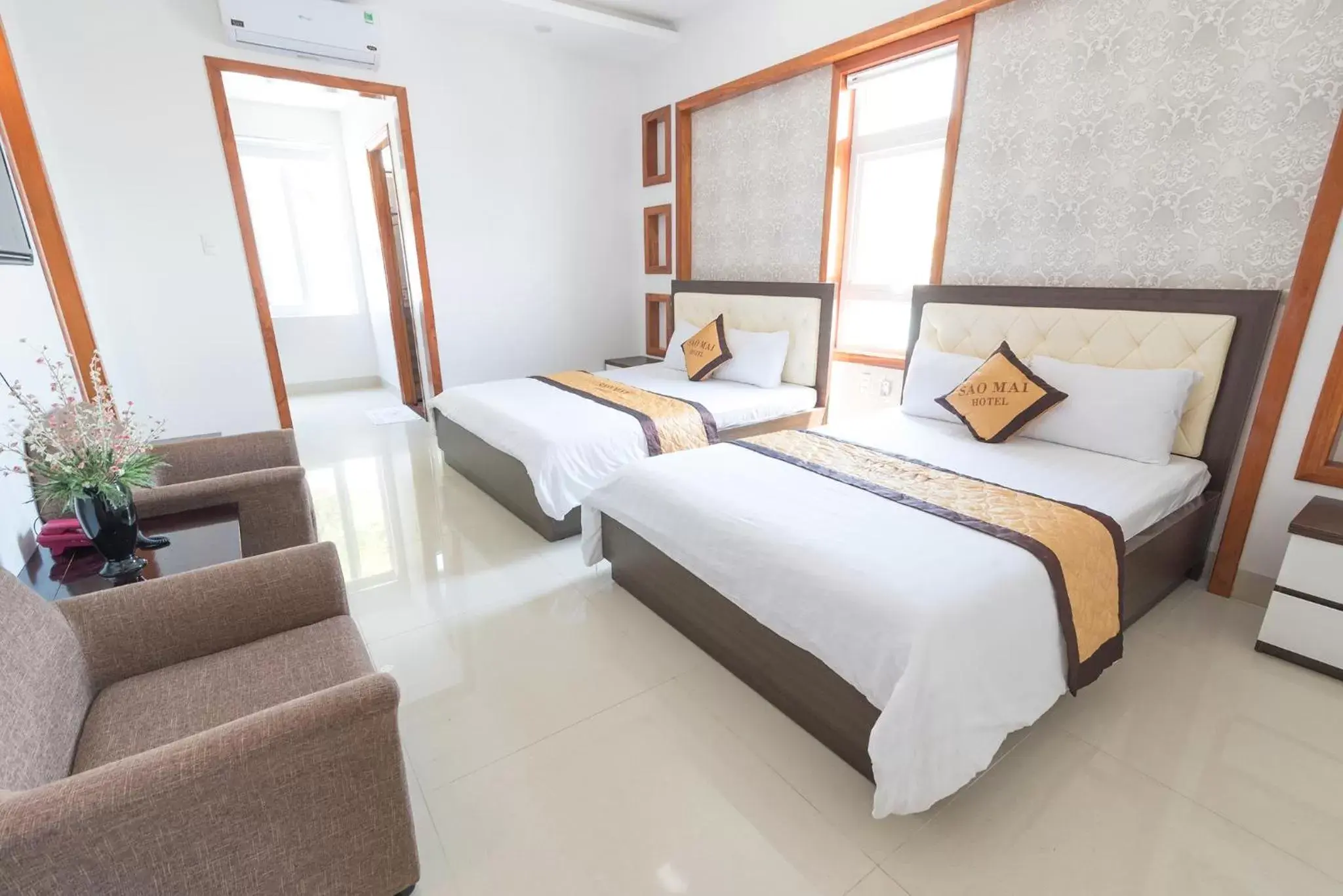 Deluxe Quadruple Room in Sao Mai Hotel & Apartment Deluxe Quadruple Room in Sao Mai Hotel & Apartment