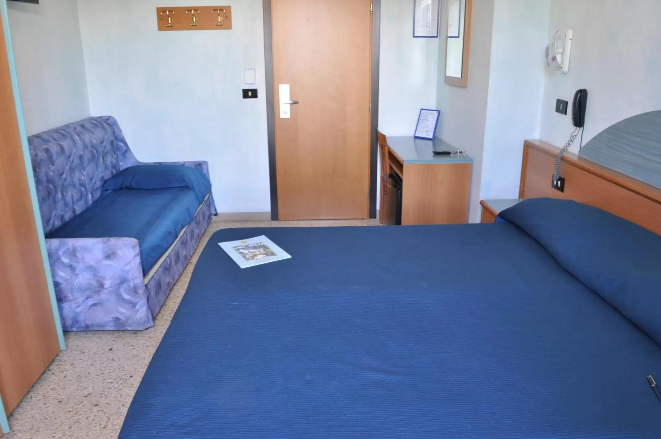 Triple Room in Hotel Roma Triple Room in Hotel Roma