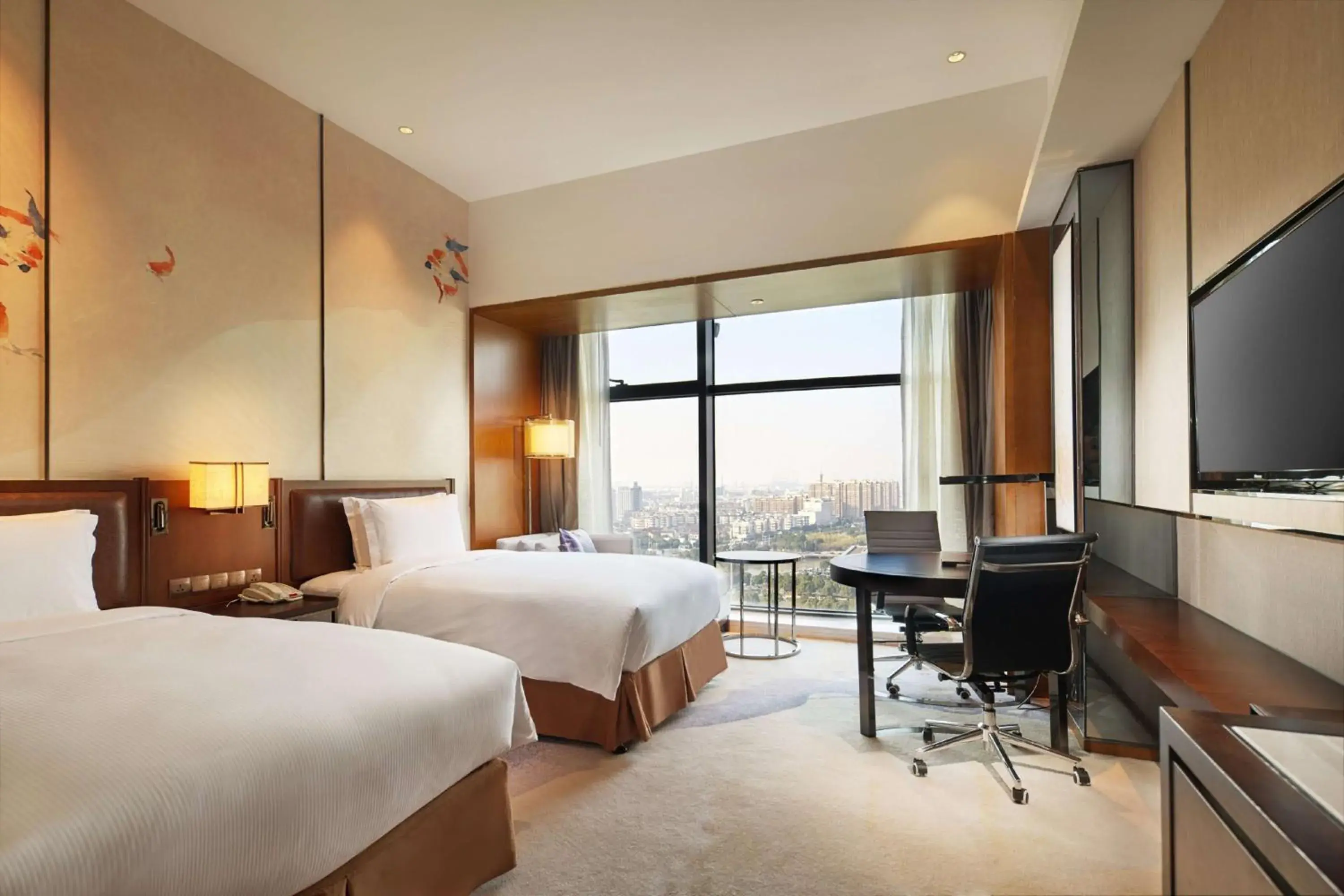Deluxe Twin Room with Garden View in DoubleTree By Hilton Ningbo Beilun Deluxe Twin Room with Garden View in DoubleTree By Hilton Ningbo Beilun