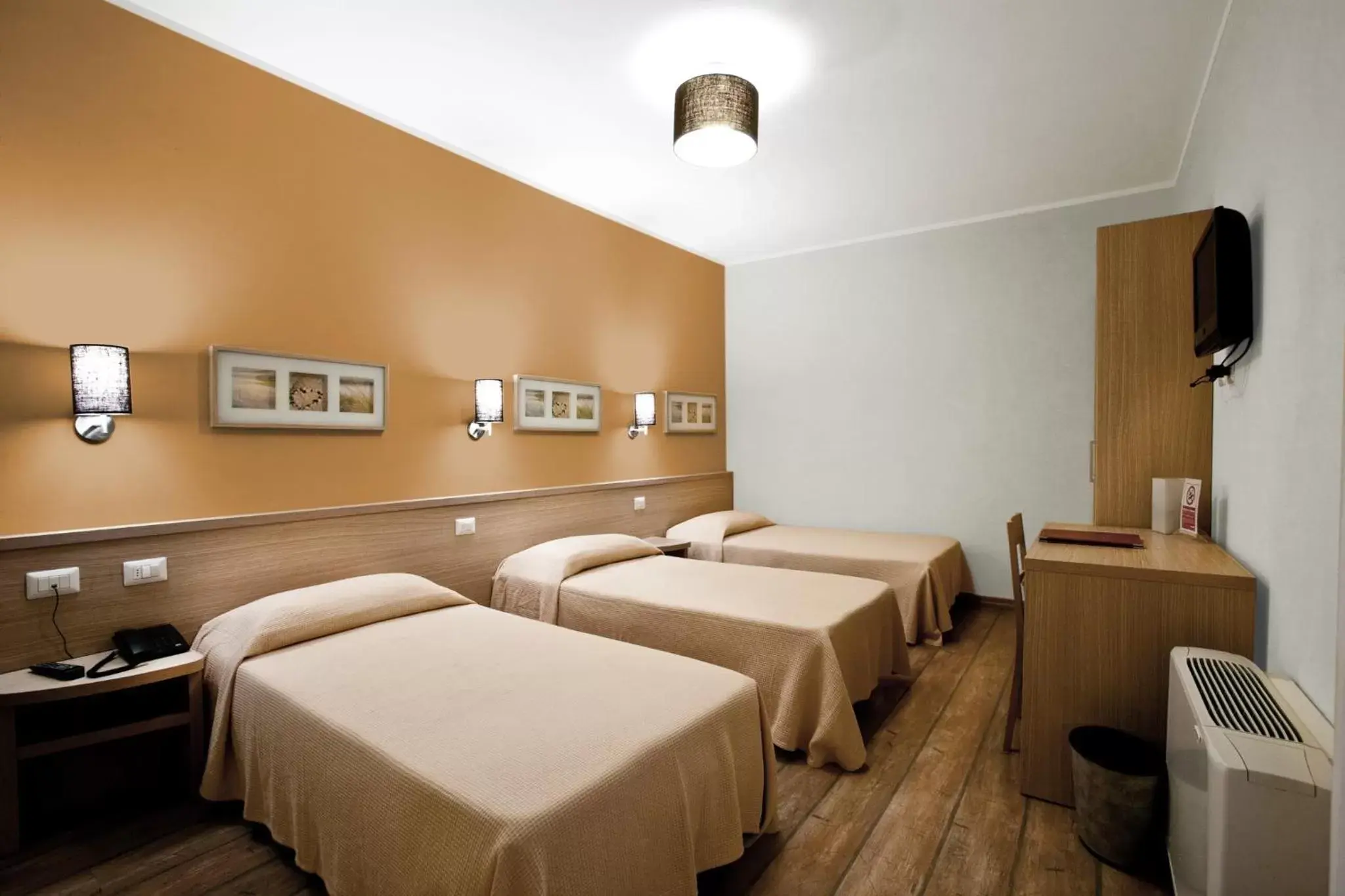 Triple Room in Hotel La Campagnola Triple Room in Hotel La Campagnola